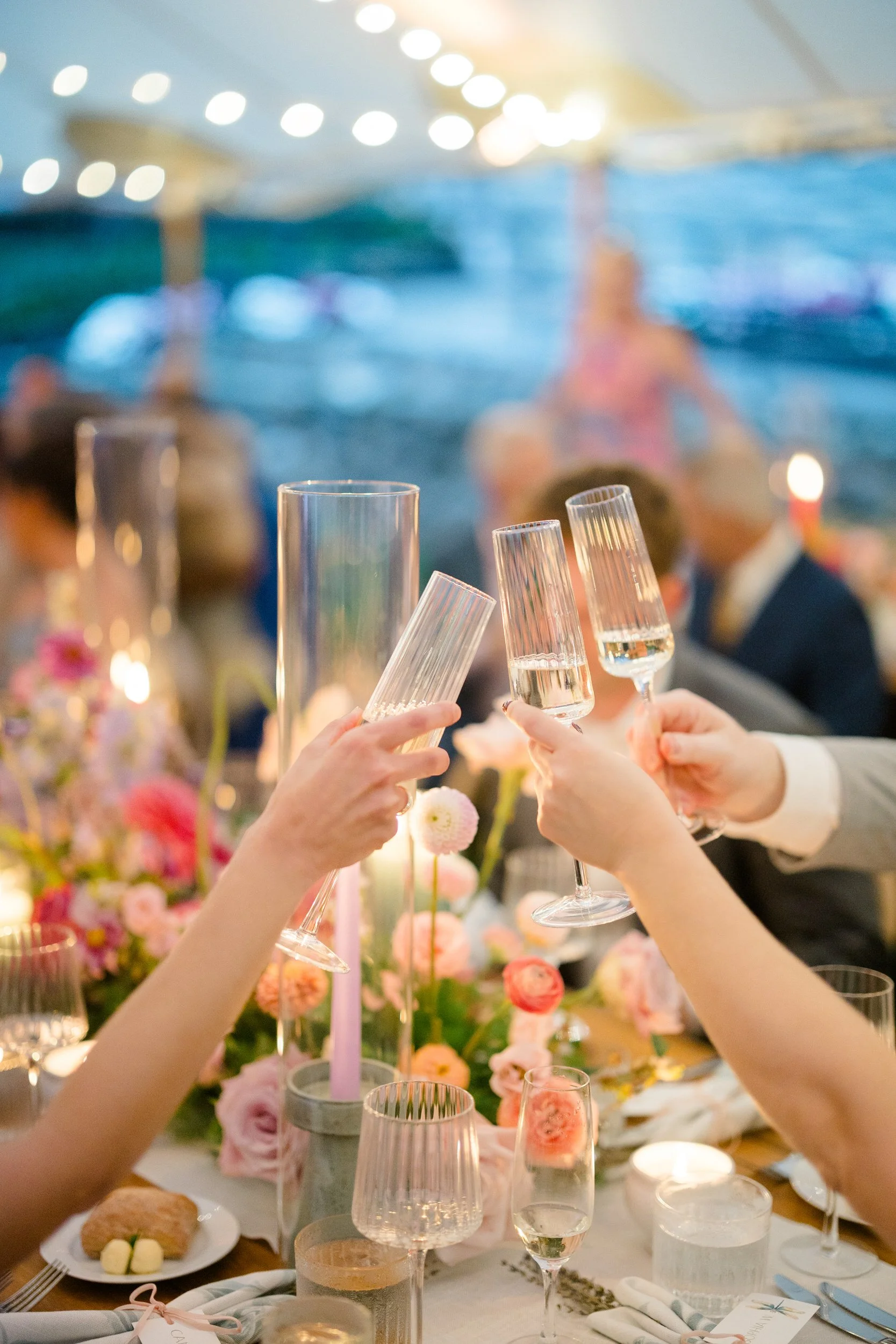 Colorful Connors Center wedding reception filled with vibrant flowers and joyful dancing.