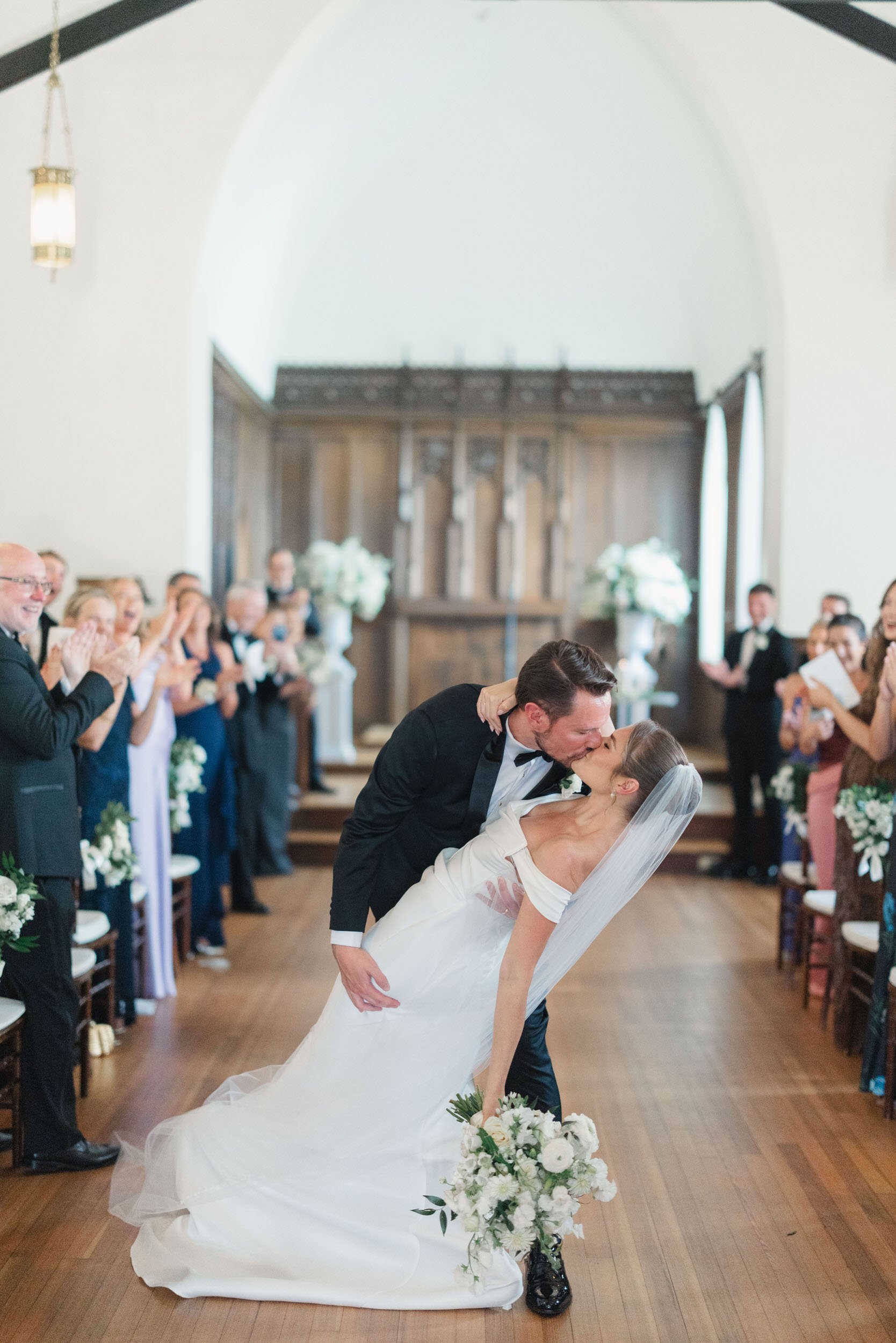 Documentary wedding ceremony coverage by a Rosecliff wedding photographer