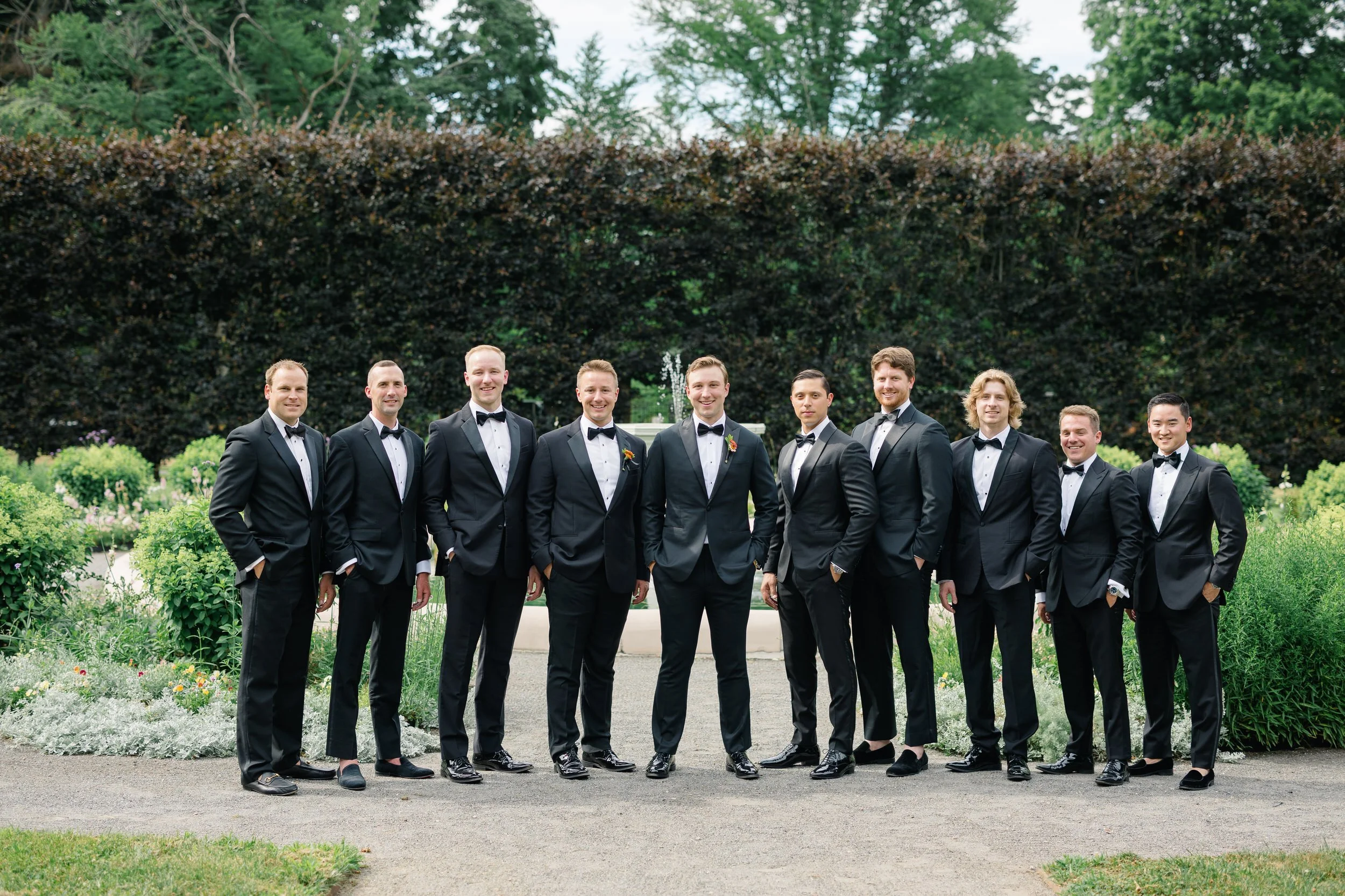 Groom and groomsmen portraits at The Gardens at Elm Bank