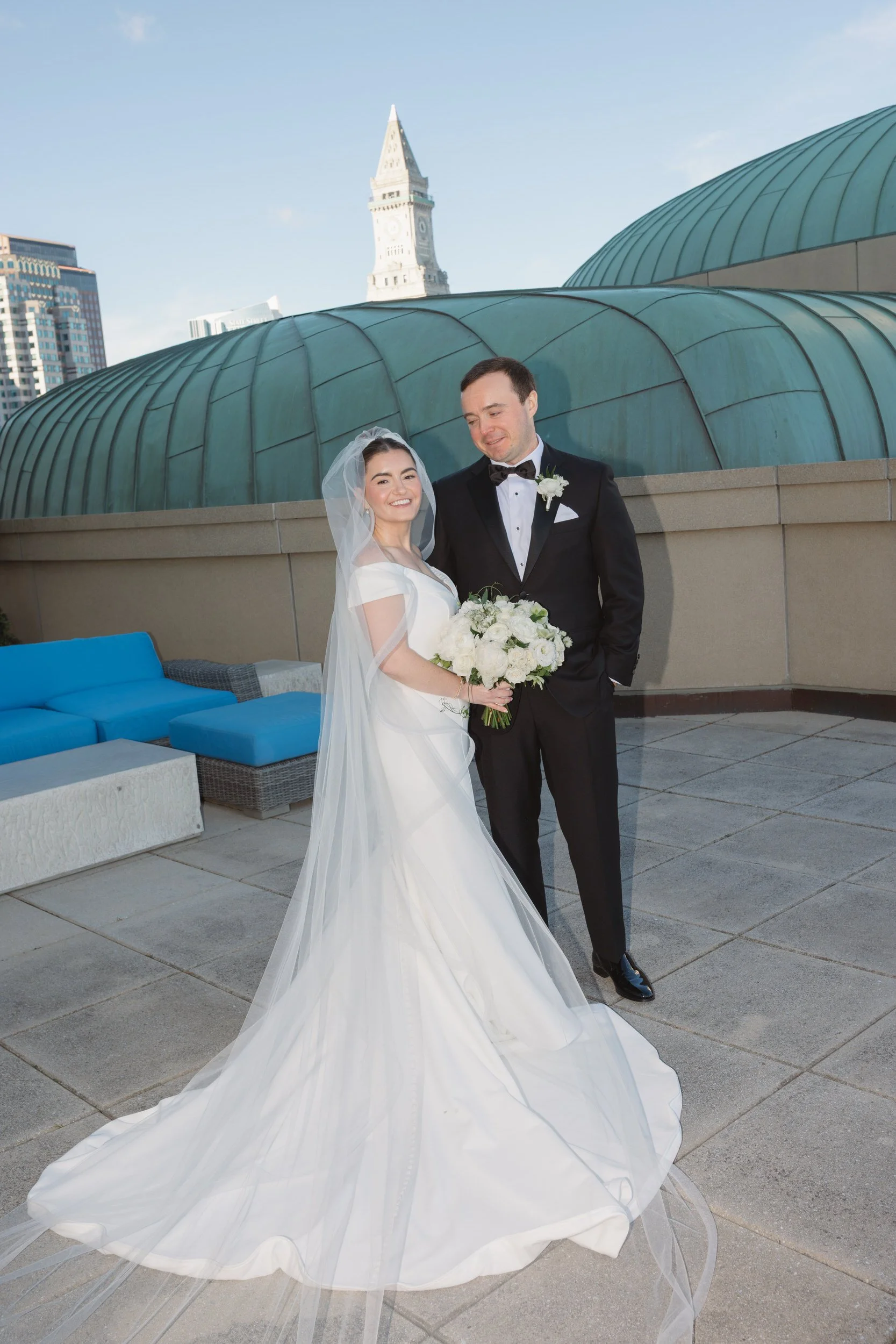 Documentary-style first look photography at the Boston Harbor Hotel