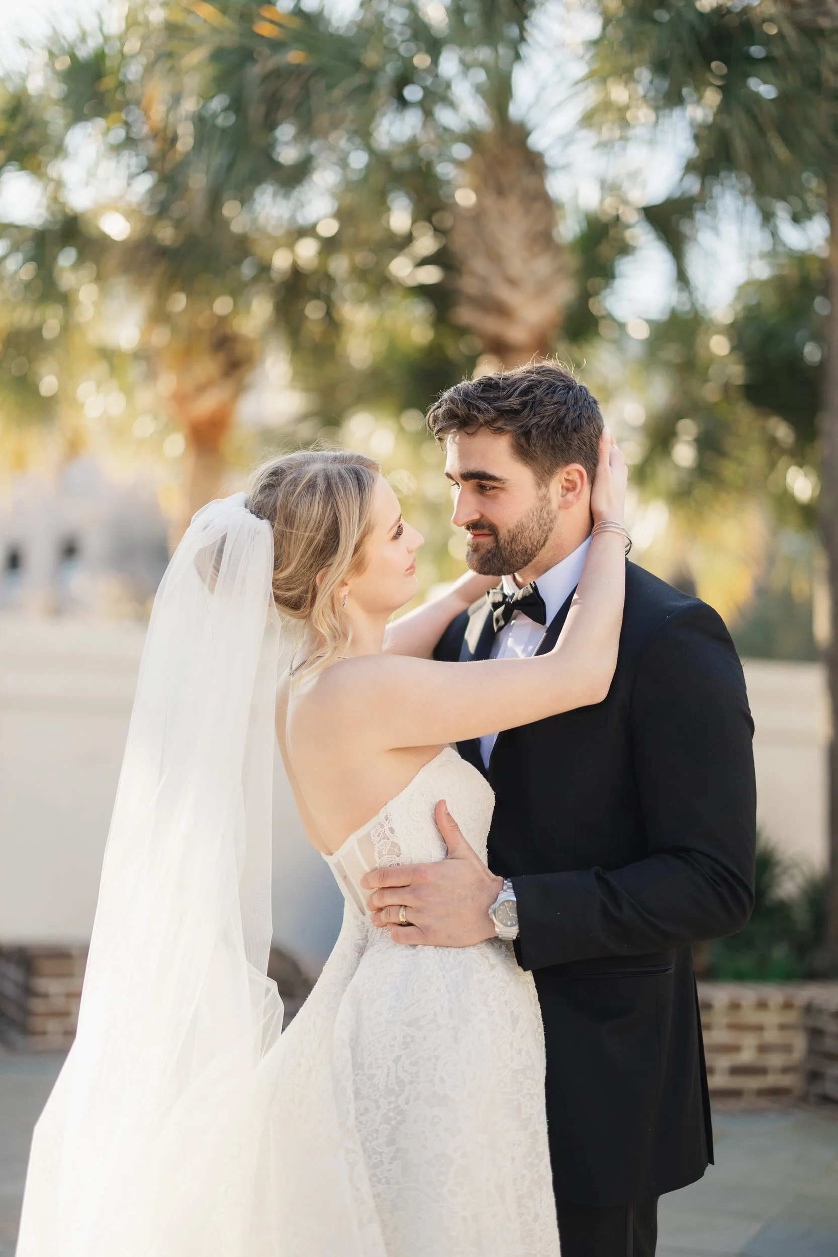 Bride and groom sharing a quiet moment during their spring wedding at The Gadsen House in Charleston, South Carolina.