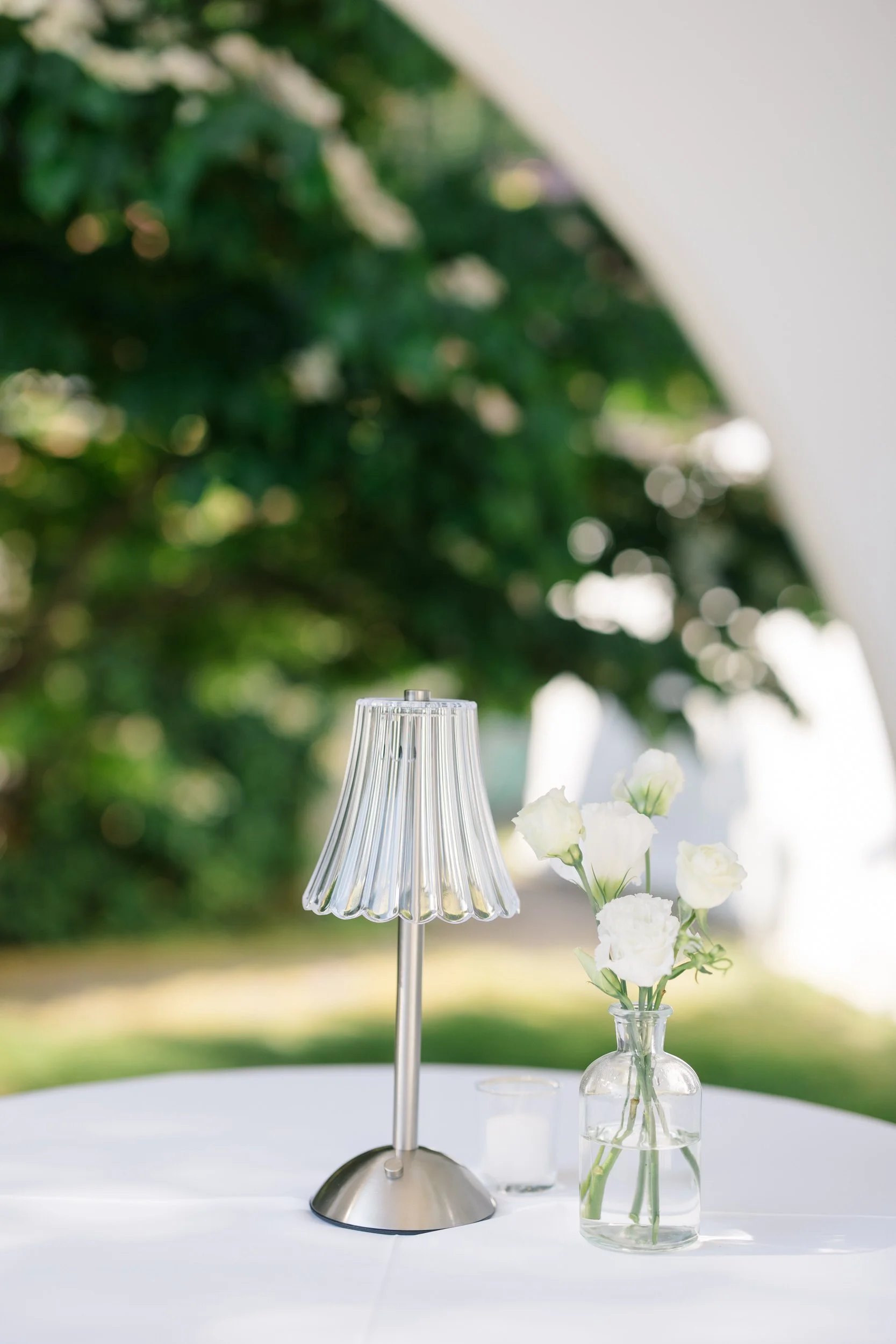 Garden party cocktail hour details with elegant summer wedding décor.
