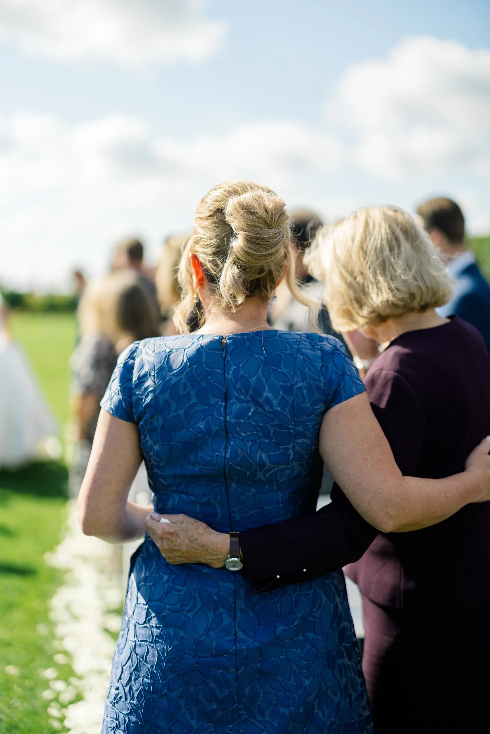 Outdoor wedding ceremony on the lawn at Wychmere Beach Club's Dune space.