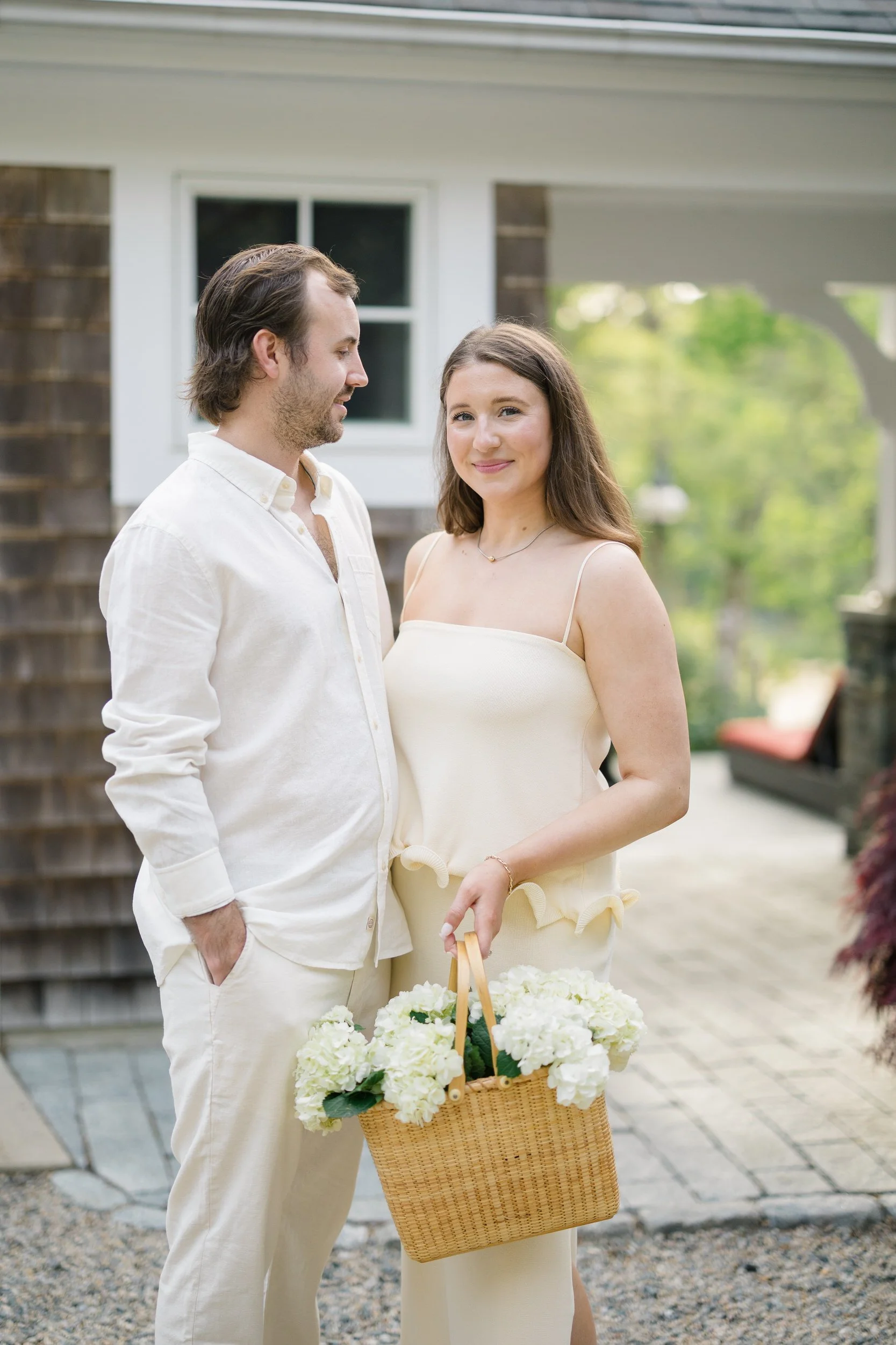 Romantic Cape Cod engagement session at a coastal cottage in Chatham featuring relaxed, elevated coastal chic styling.