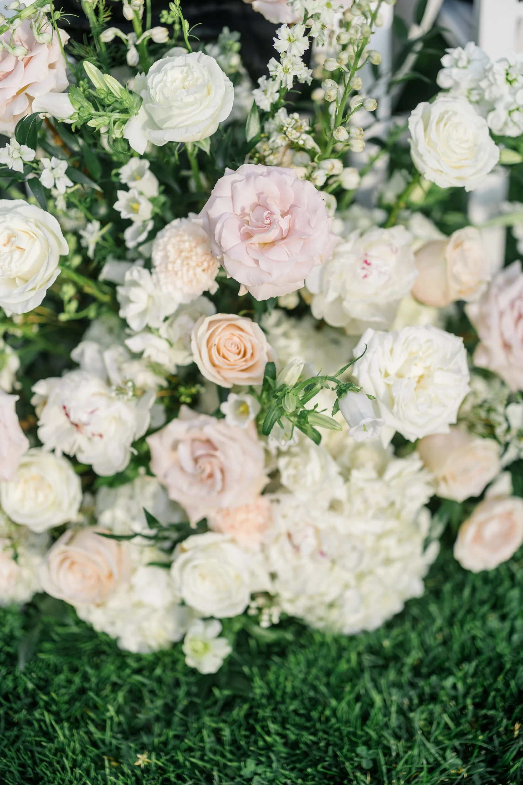 Beautifully styled wedding ceremony site in the Italian Garden at Castle Hill overlooking the formal estate gardens.