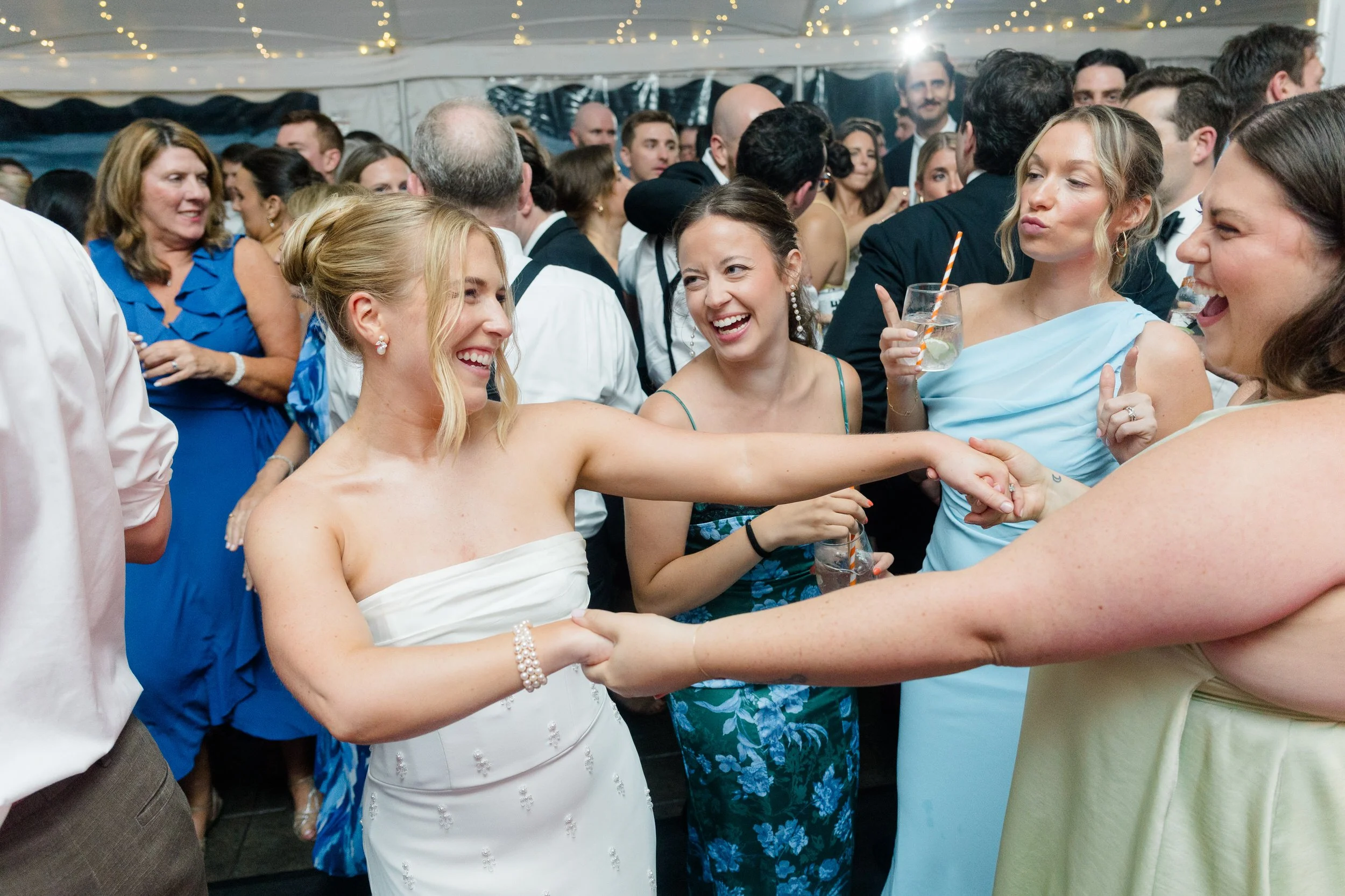 Packed dance floor during a joyful Blithewold Wedding reception.