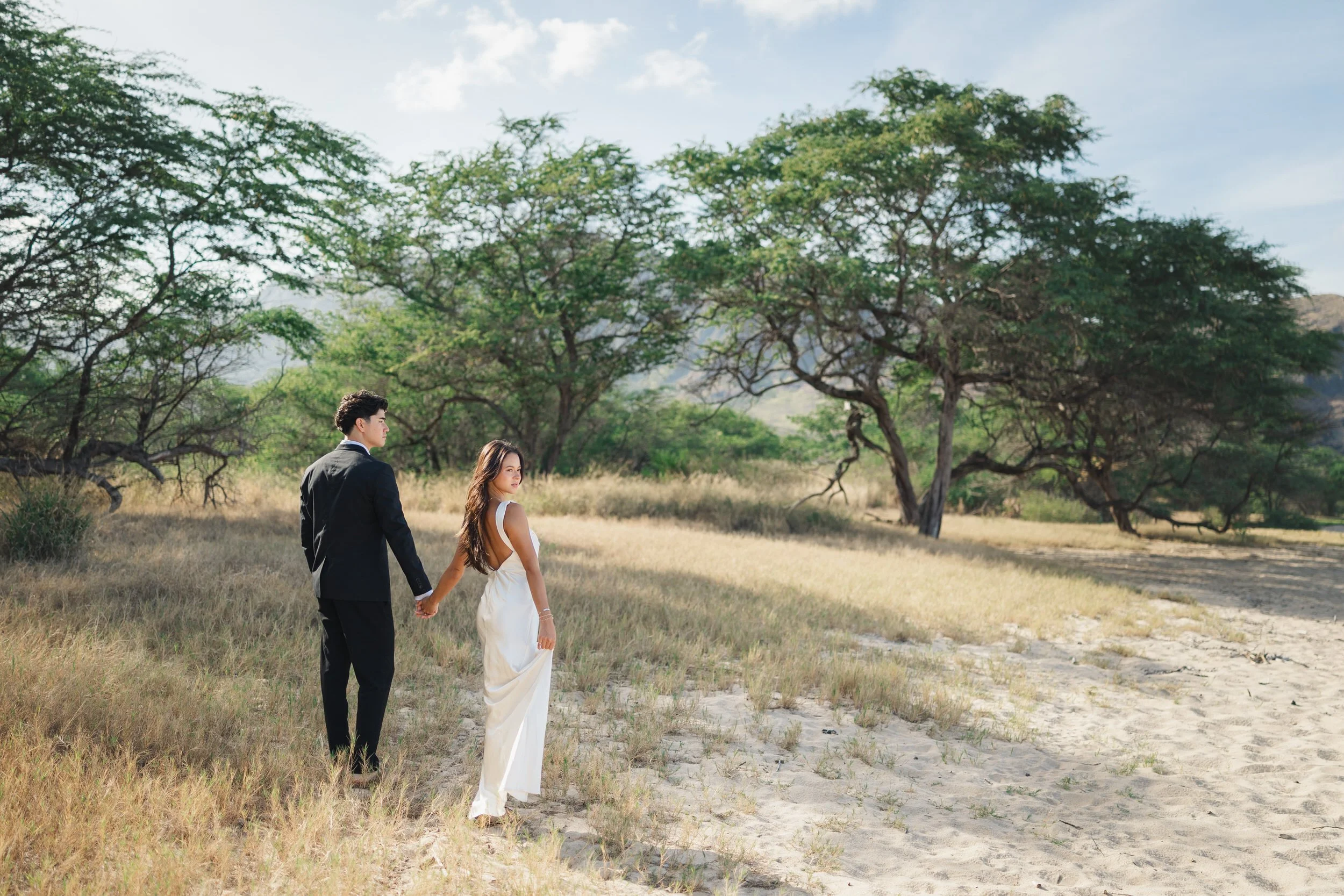 ntimate couple portrait from Oahu beach elopement ceremony