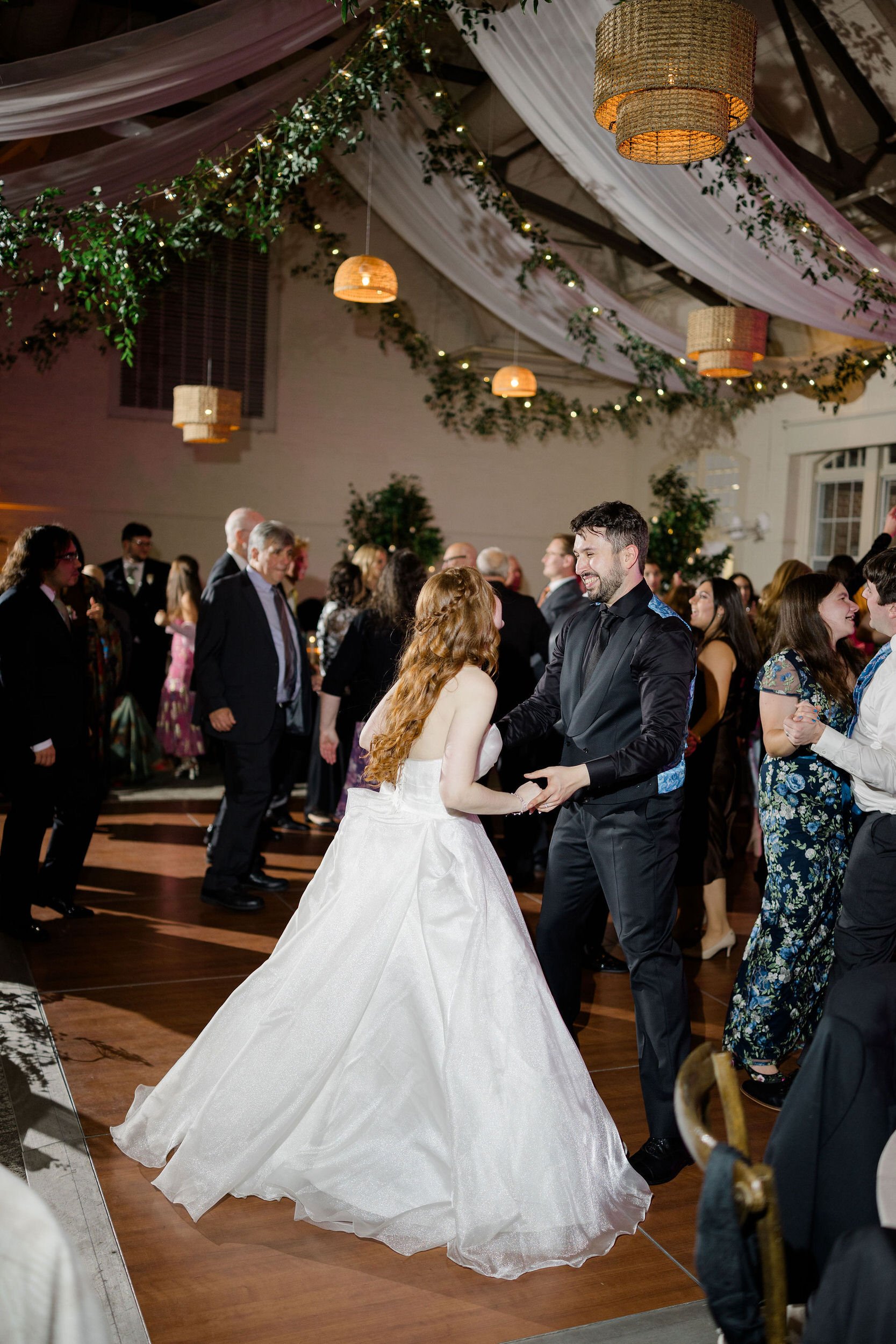 Wedding guests dancing during a reception at Elm Bank in Wellesley, Massachusetts.