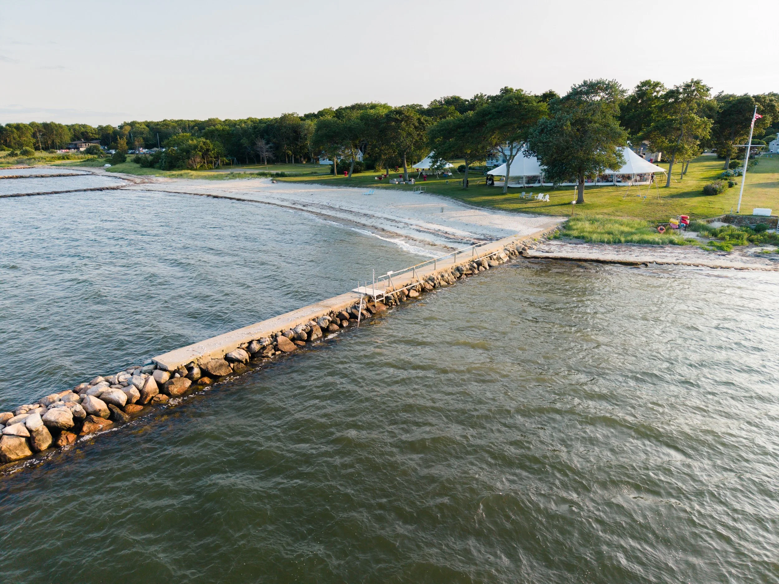 Sunset aerial view of a luxury Cape Cod wedding venue.