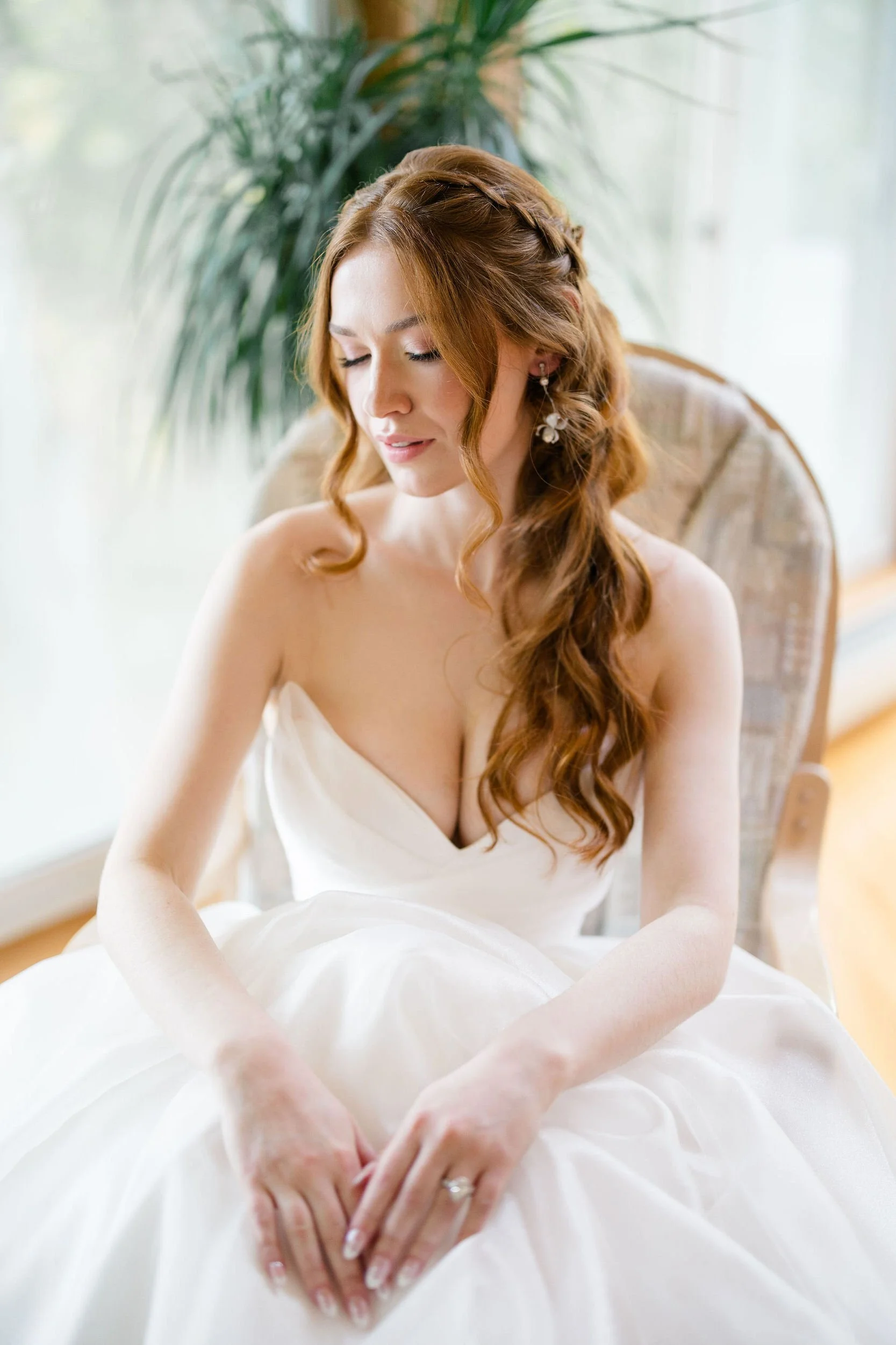 Bride preparing for a romantic secret garden inspired wedding surrounded by thoughtful bridal details.