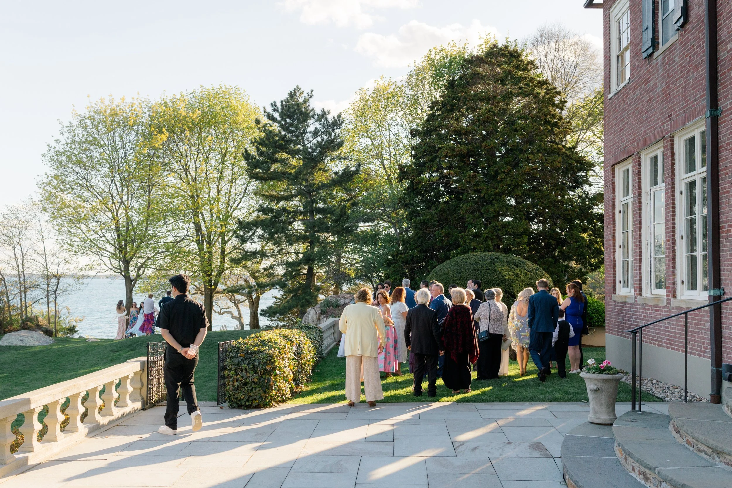 Guests enjoying cocktail hour overlooking the ocean at Misselwood Estate