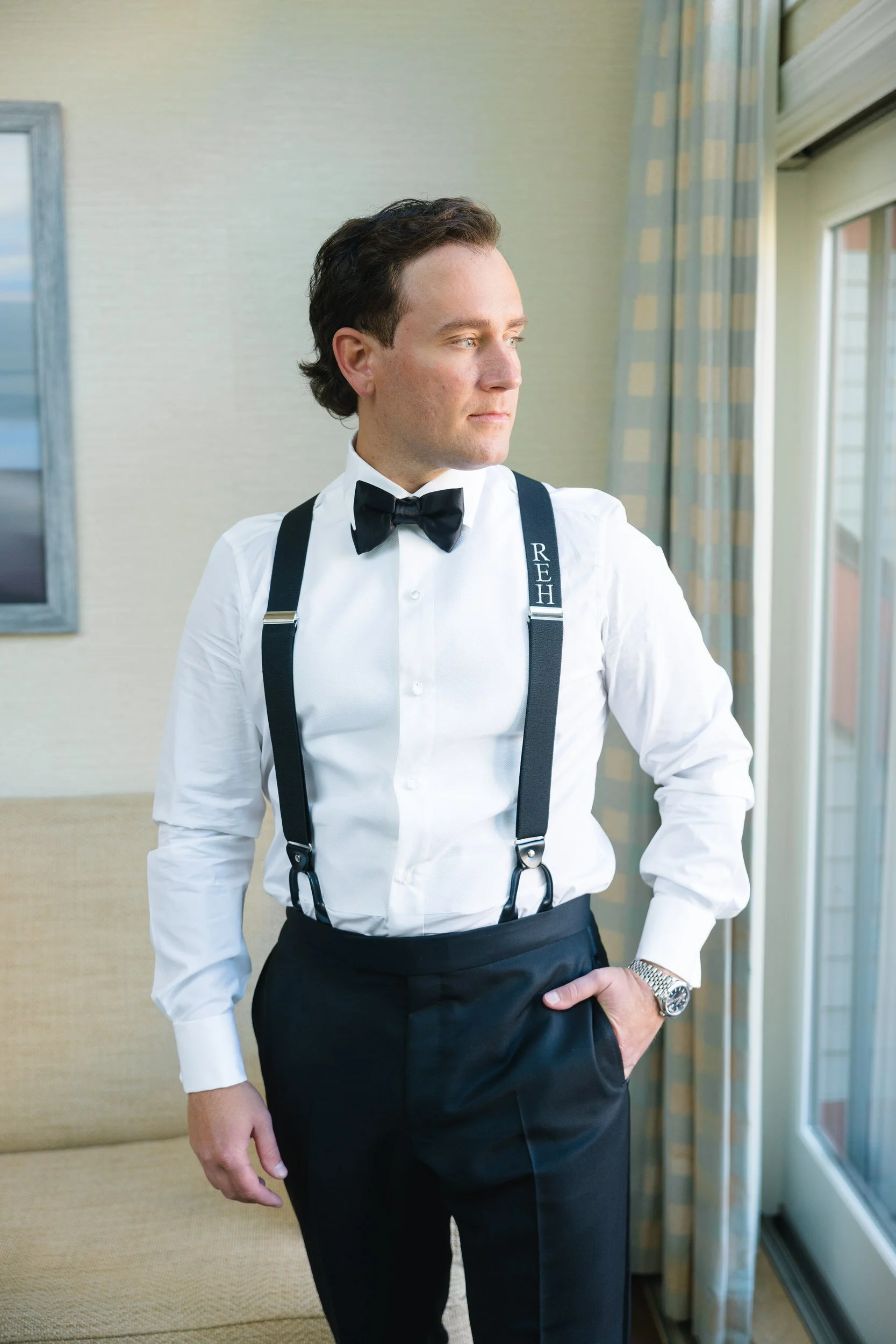 Groom getting ready for his wedding at Wychmere Beach Club on Cape Cod.