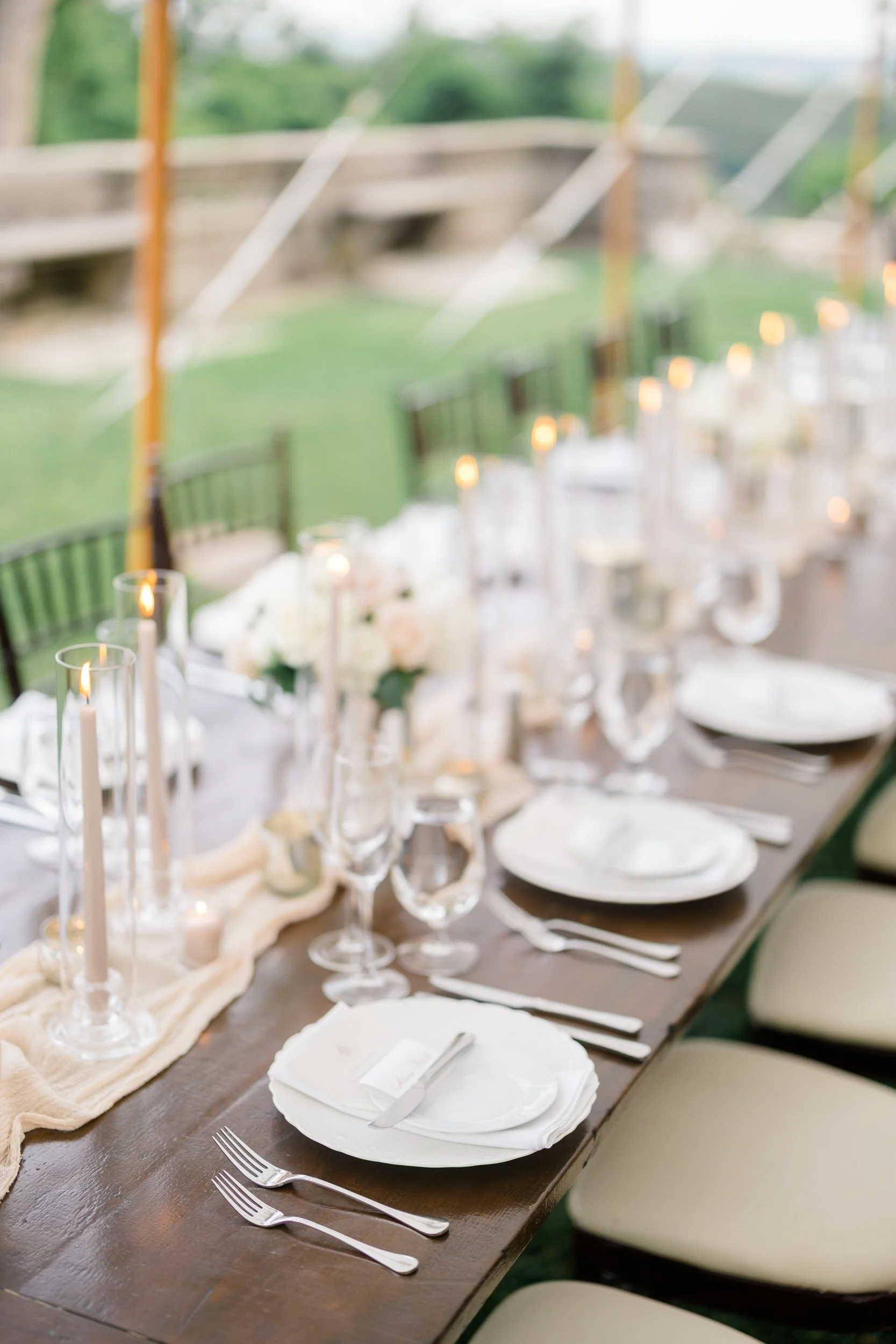 Romantic evening reception details captured inside the tent at Crane Estate in Ipswich.