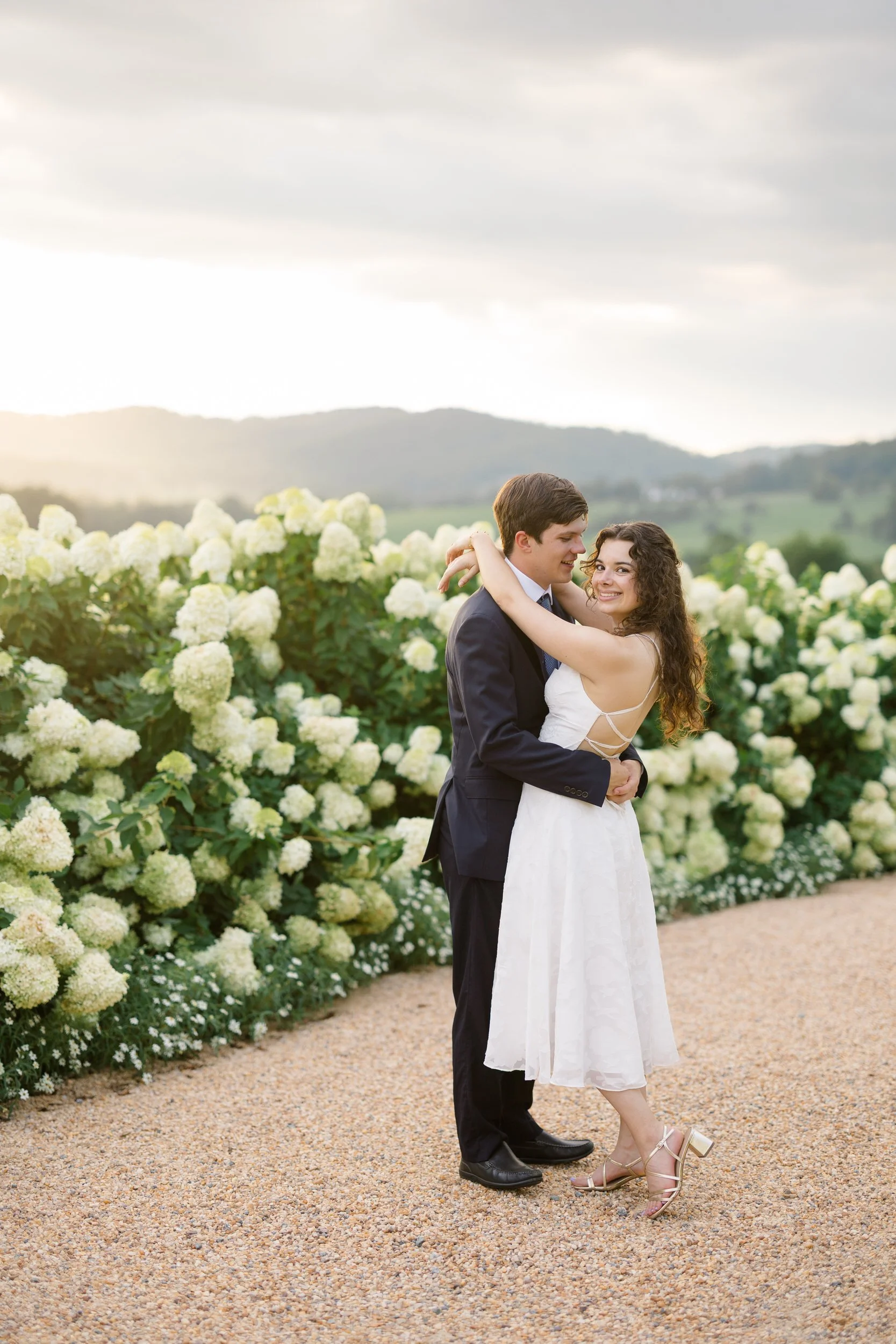 Couple embracing at sunset during their Pippin Hill engagement session