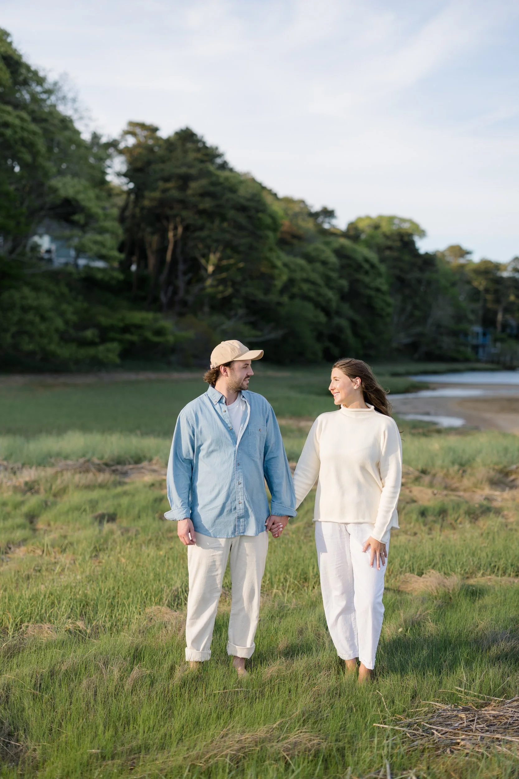 Cape Cod engagement session in Chatham featuring a beach portrait with dune grass and coastal wind.