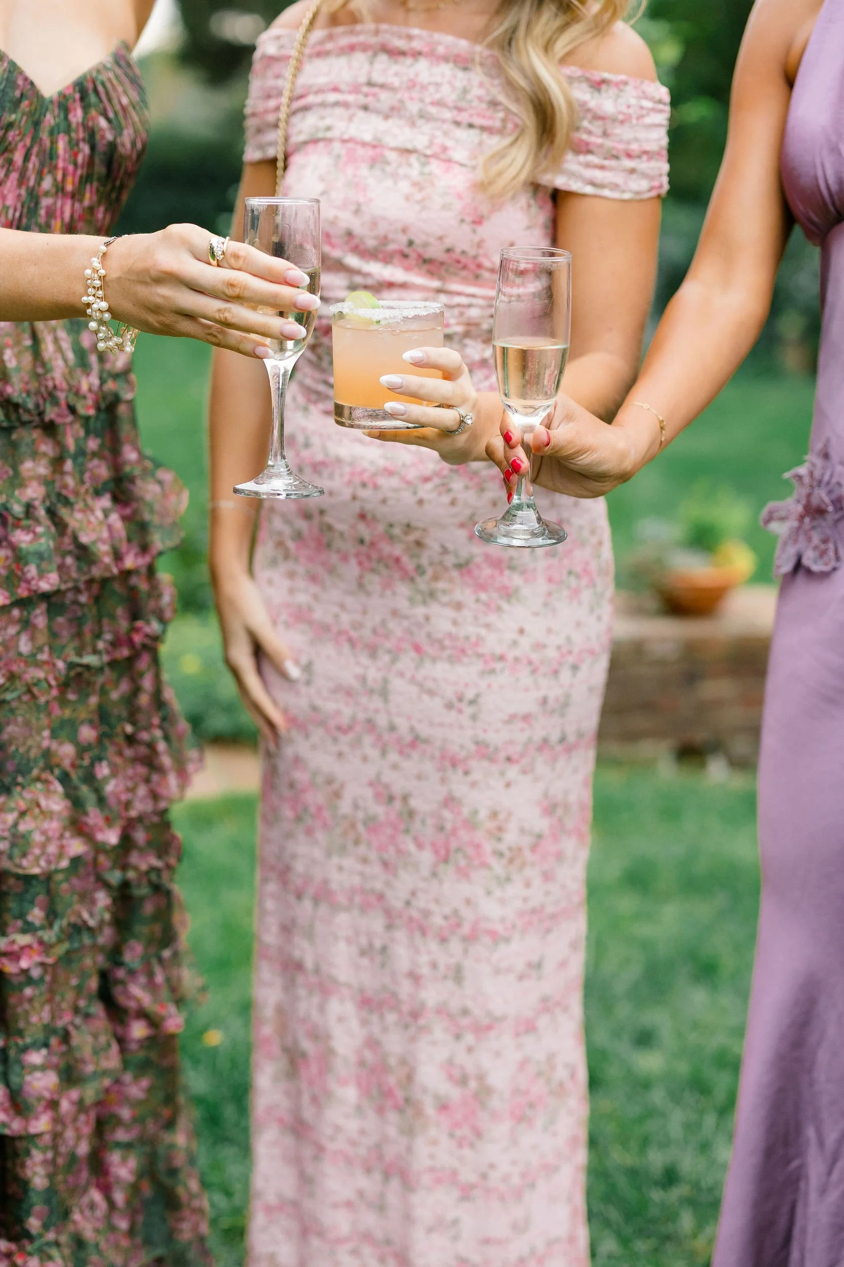 Candid wedding photography of guests celebrating outdoors at Long Hill.