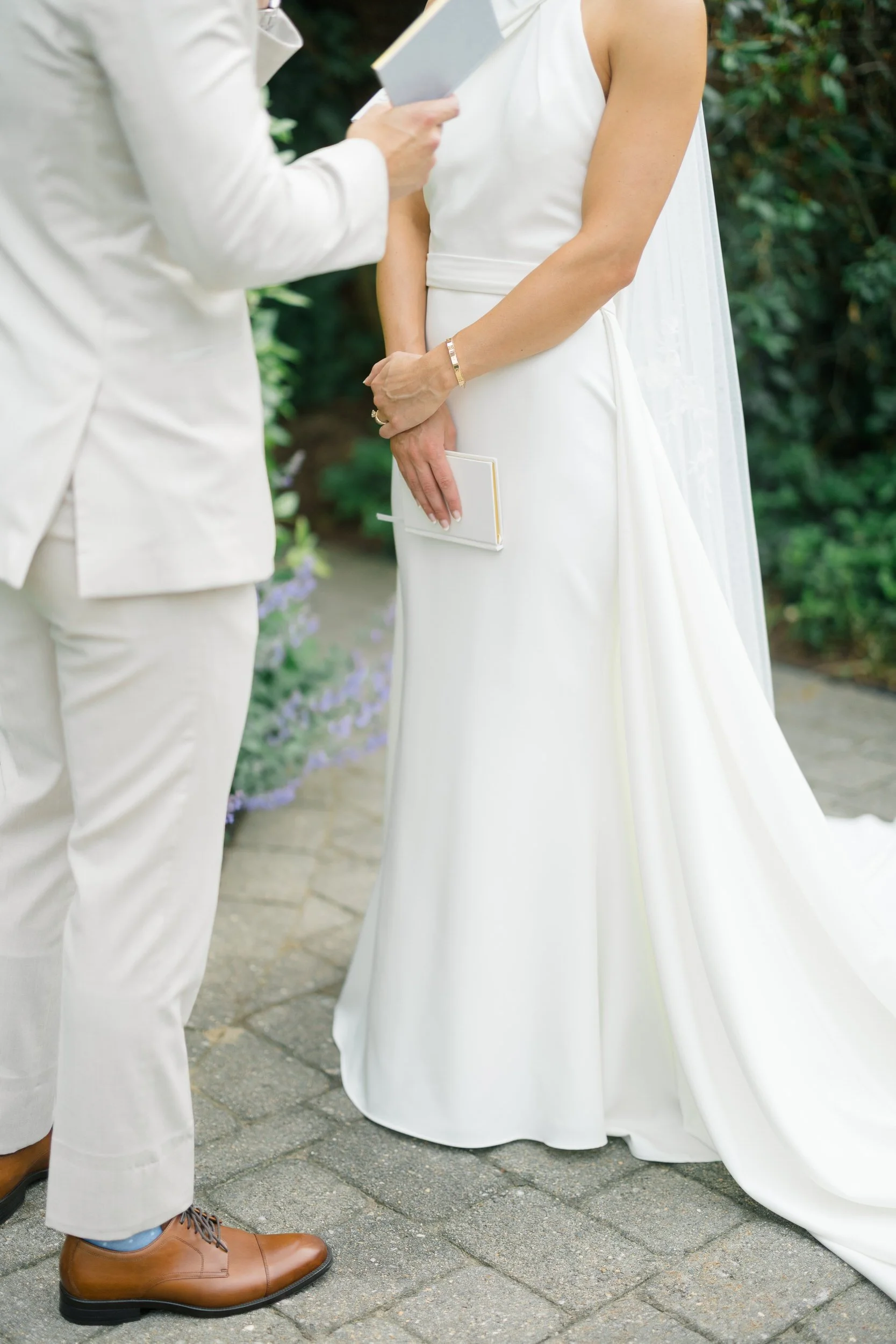 Emotional moment as the couple shares personal vows together.