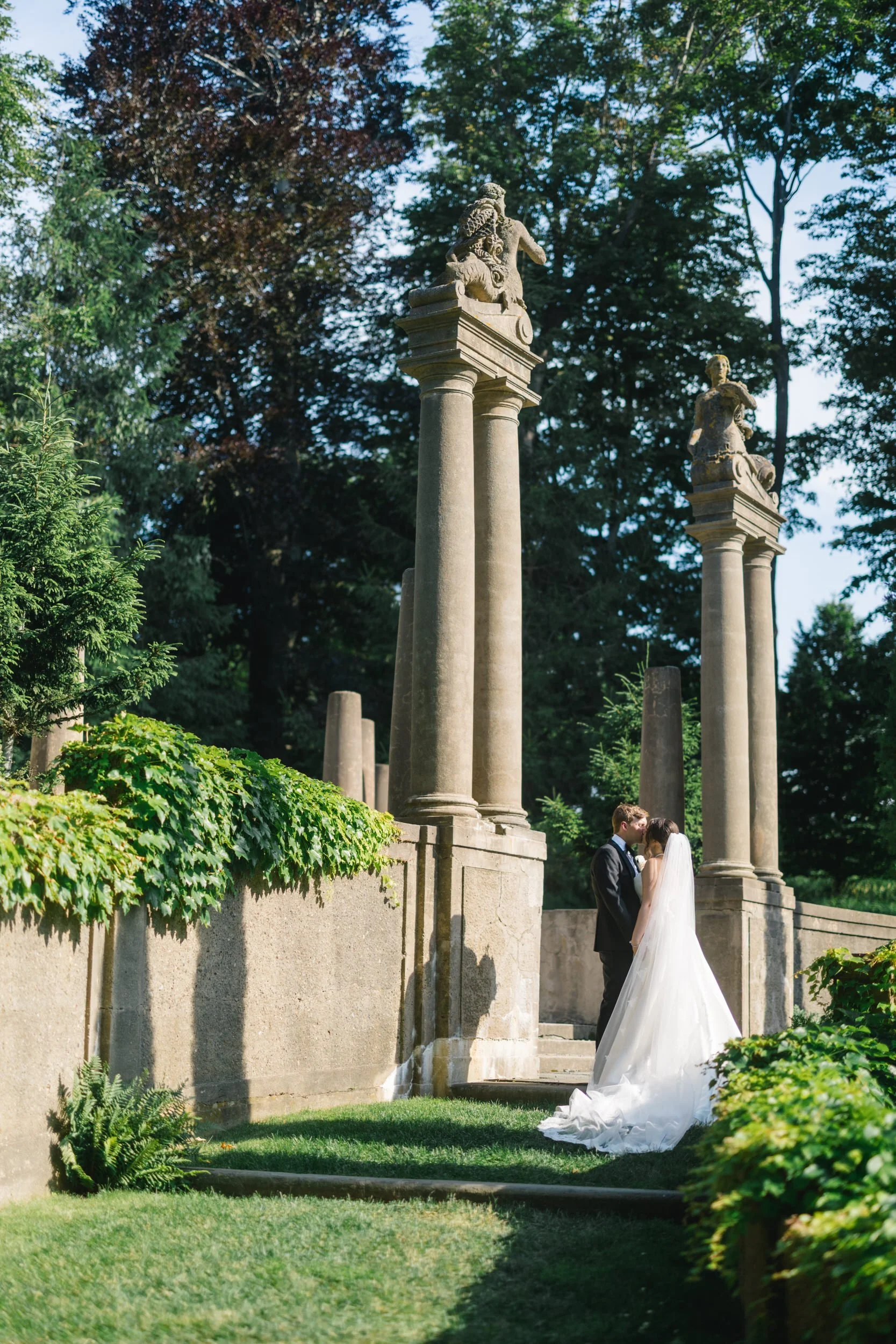 Editorial wedding portraits of the couple overlooking the North Shore coastline at Castle Hill on the Crane Estate.