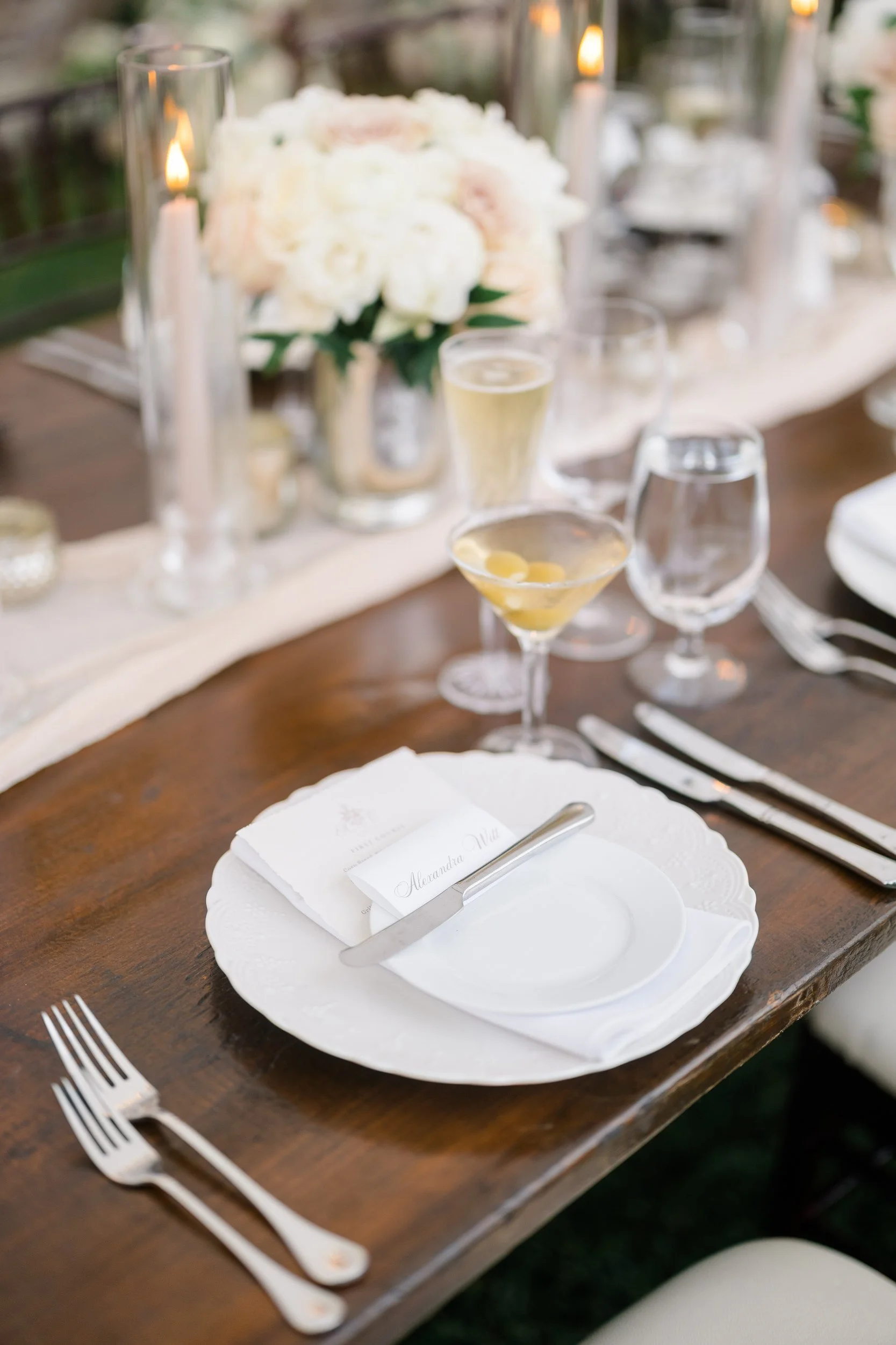 Romantic evening reception details captured inside the tent at Crane Estate in Ipswich.
