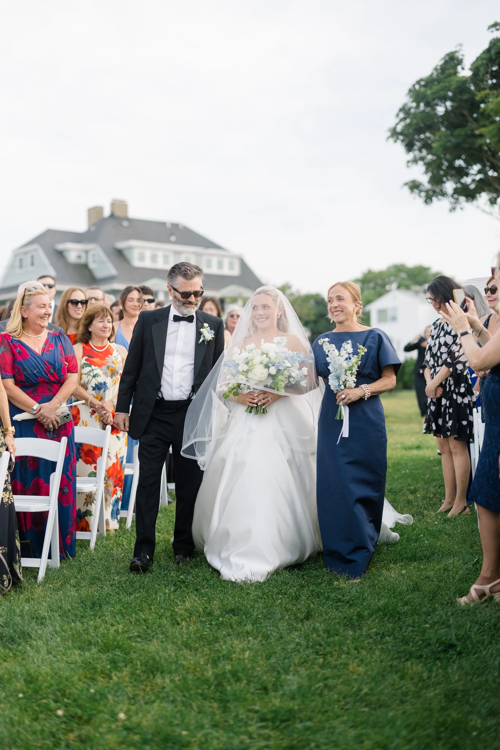 Traditional Jewish wedding ceremony at Chandler Hovey Park overlooking Marblehead Harbor during a Corinthian Yacht Club wedding celebration.
