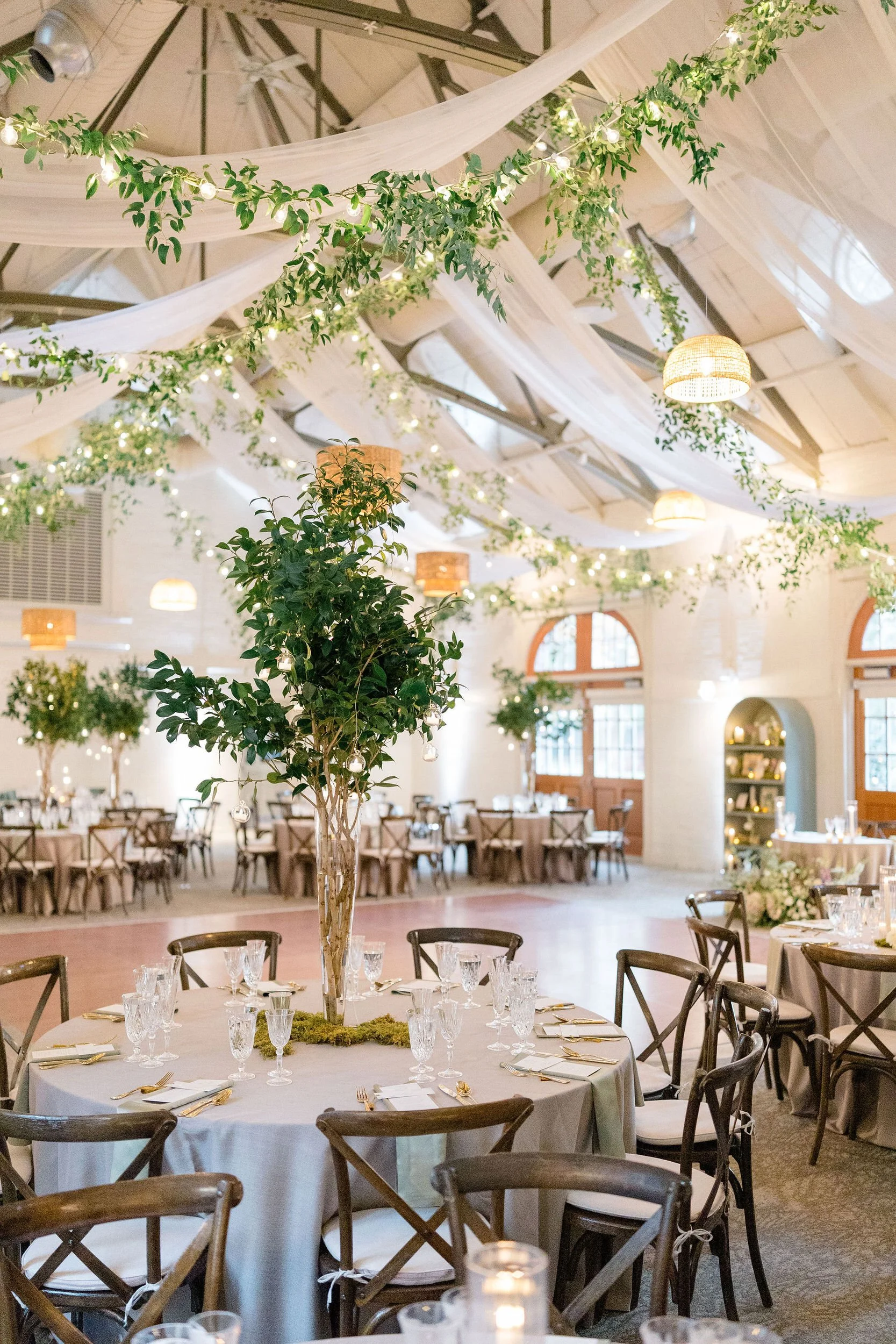 Floral reception centerpieces at a wedding at Elm Bank Gardens.