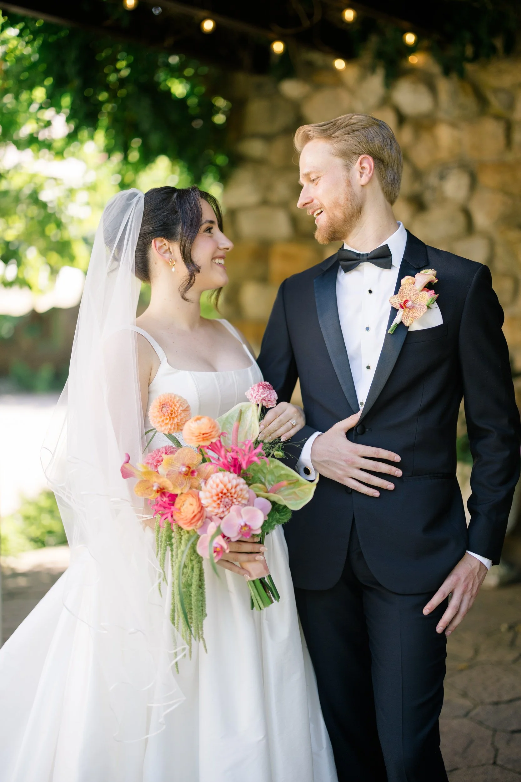 Garden grounds at Willowdale Estate wedding venue filled with greenery and vibrant floral installations