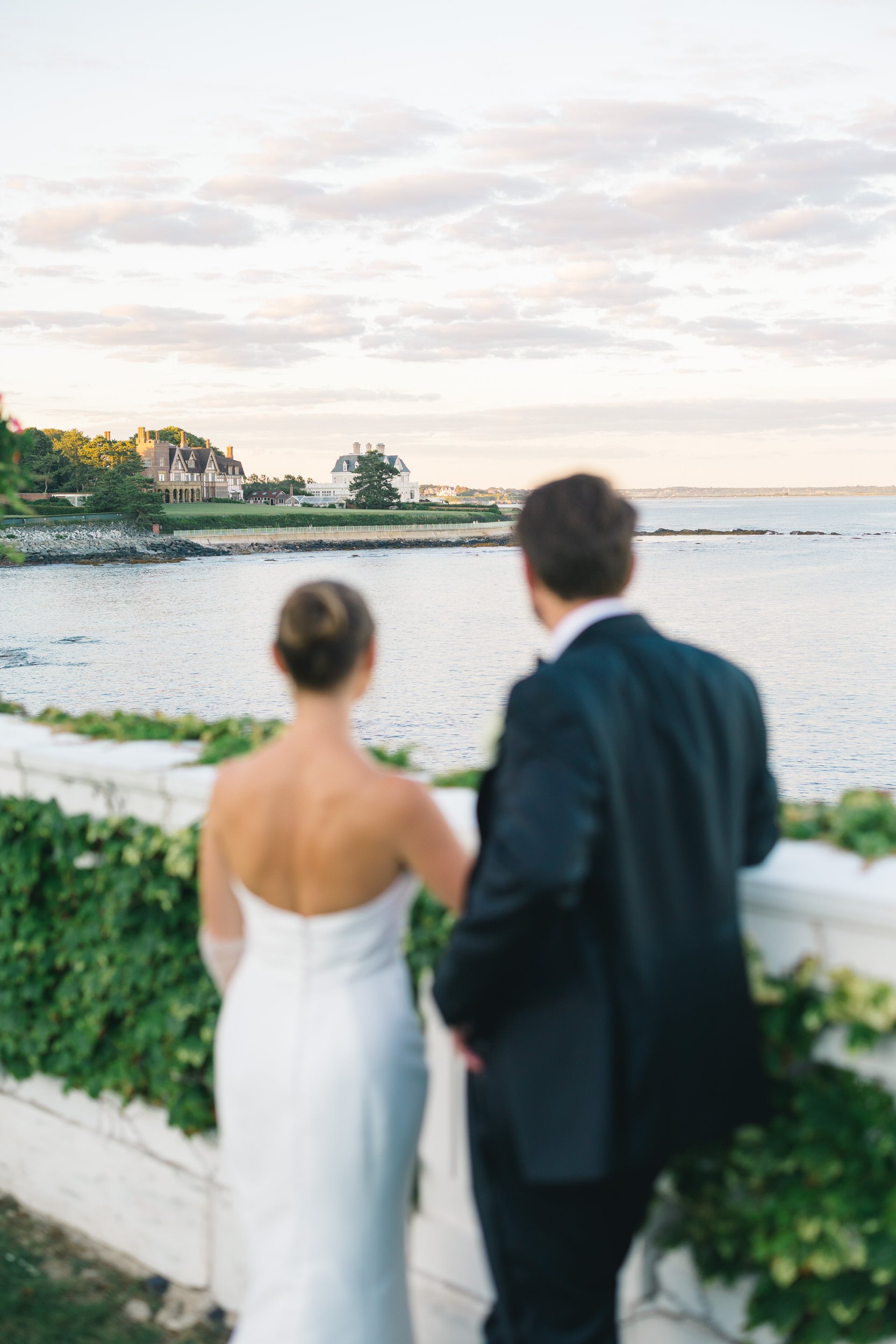 Warm golden light portraits at a Newport wedding