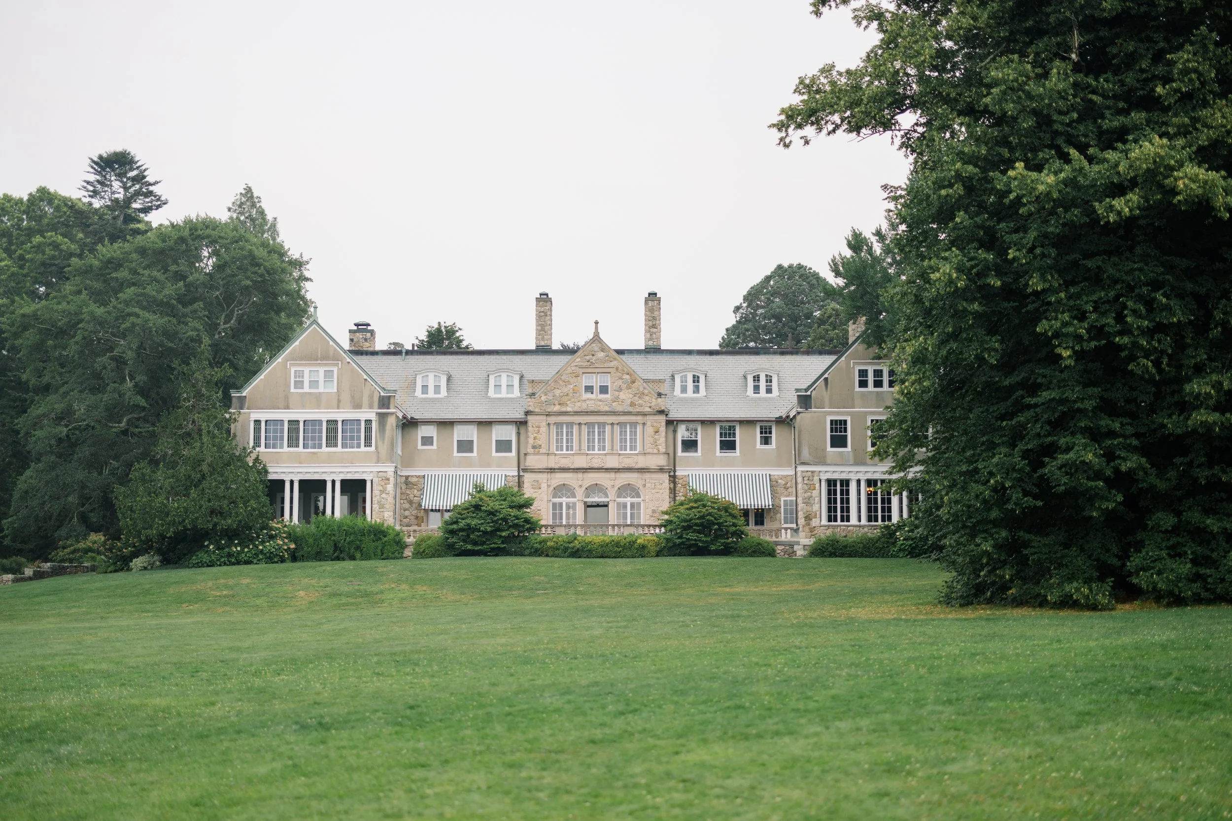 Exterior of historic Blithewold Mansion overlooking Narragansett Bay.