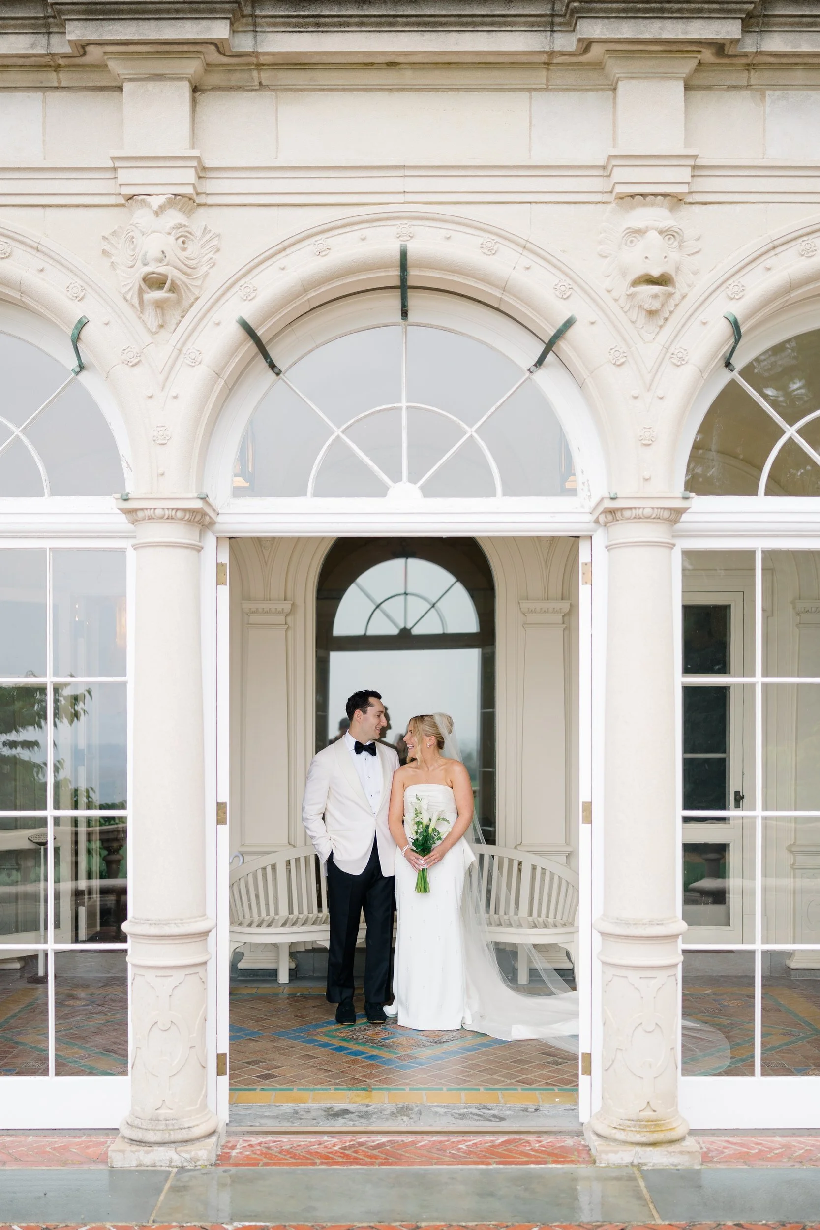 Editorial wedding portraits inside historic Blithewold Mansion.