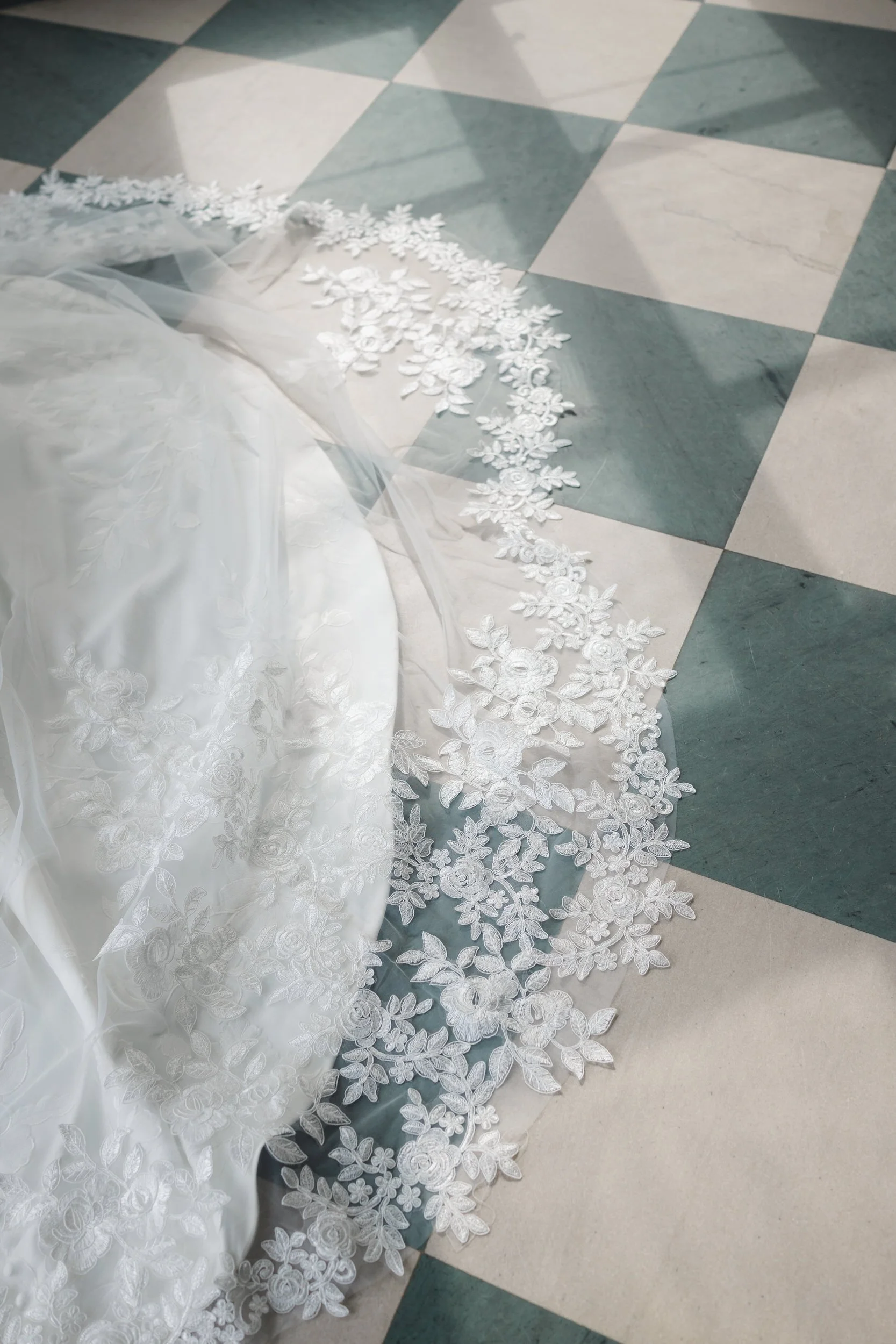 Luxury coastal wedding details with garden-inspired floral palette