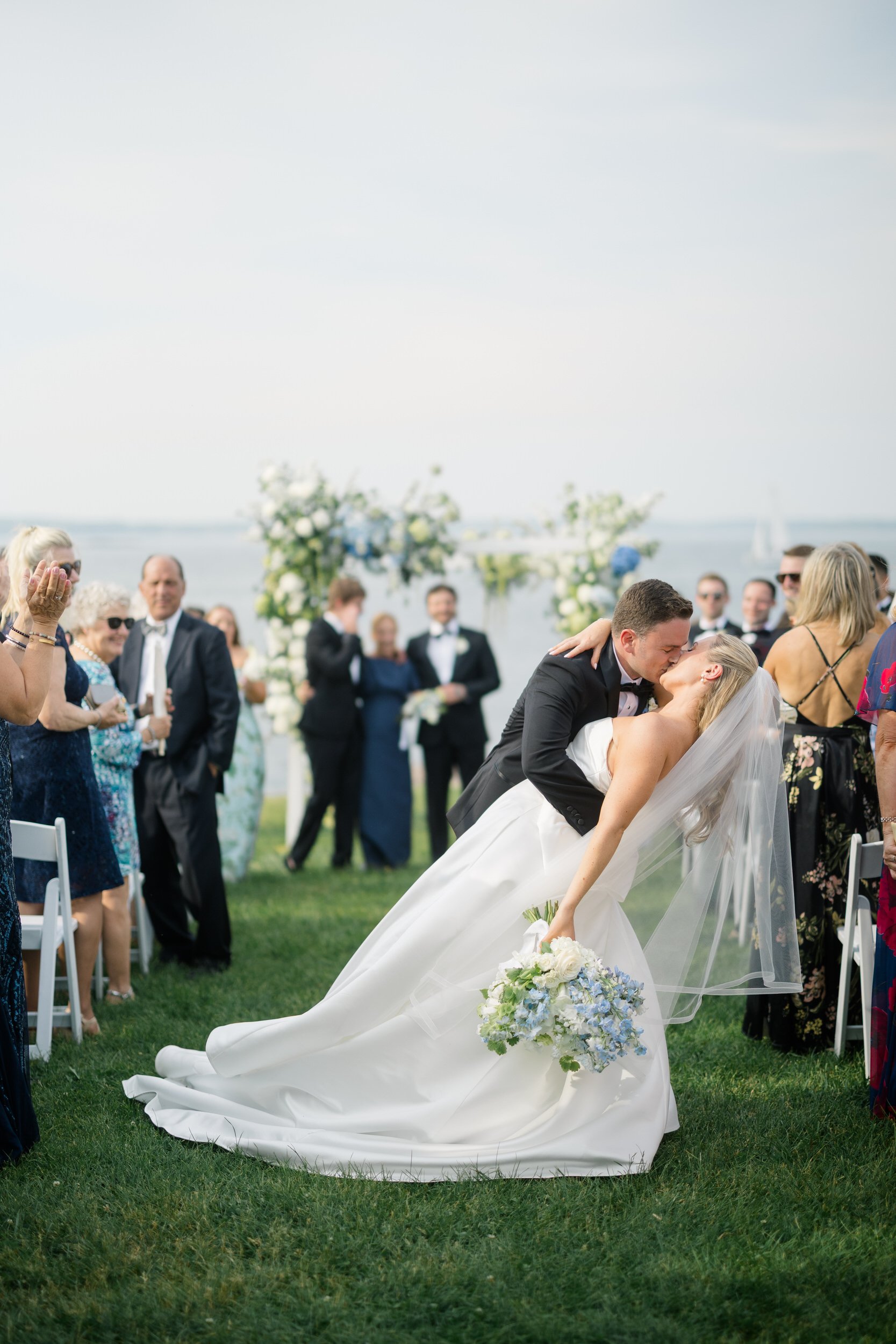 Romantic waterfront wedding ceremony at Chandler Hovey Park on the North Shore of Massachusetts.