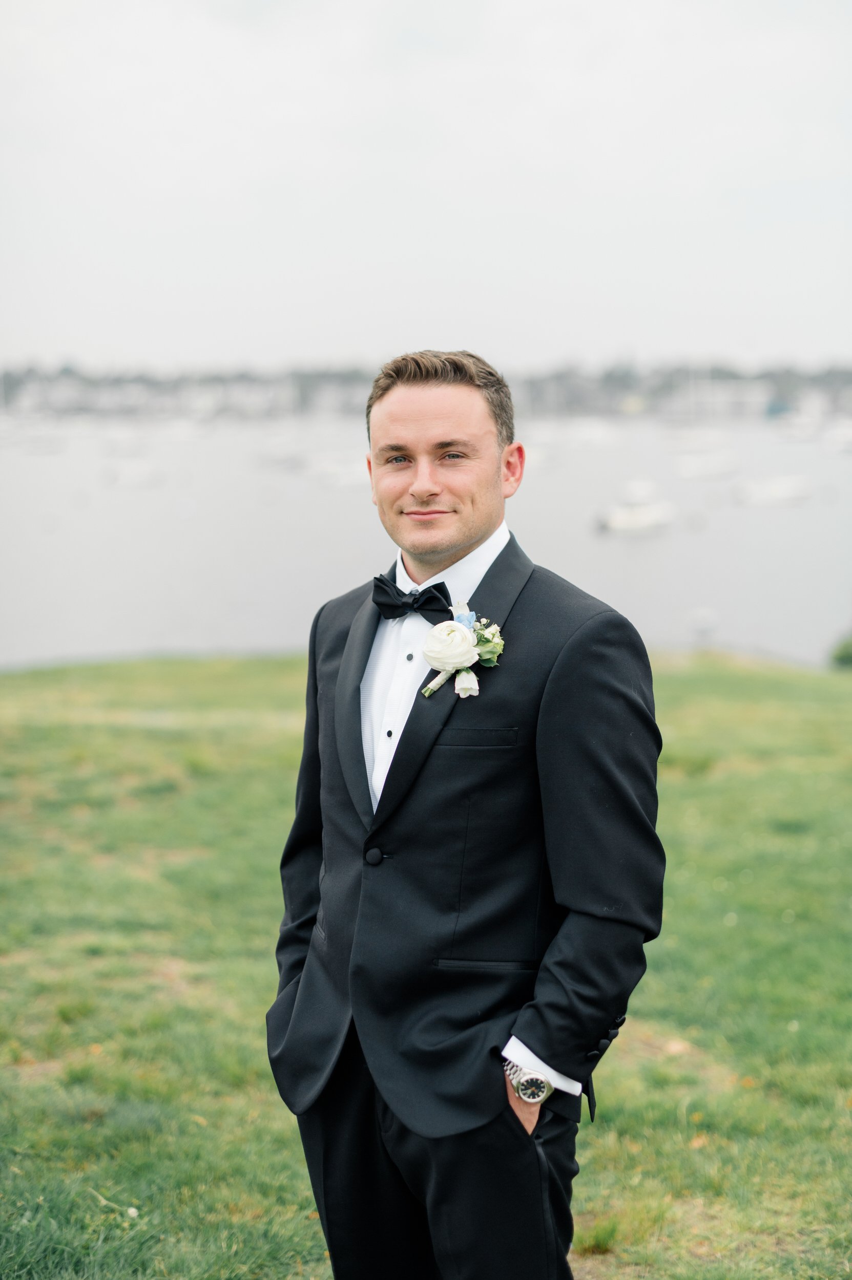 Wedding party portraits overlooking Marblehead Harbor at Chandler Hovey Park.