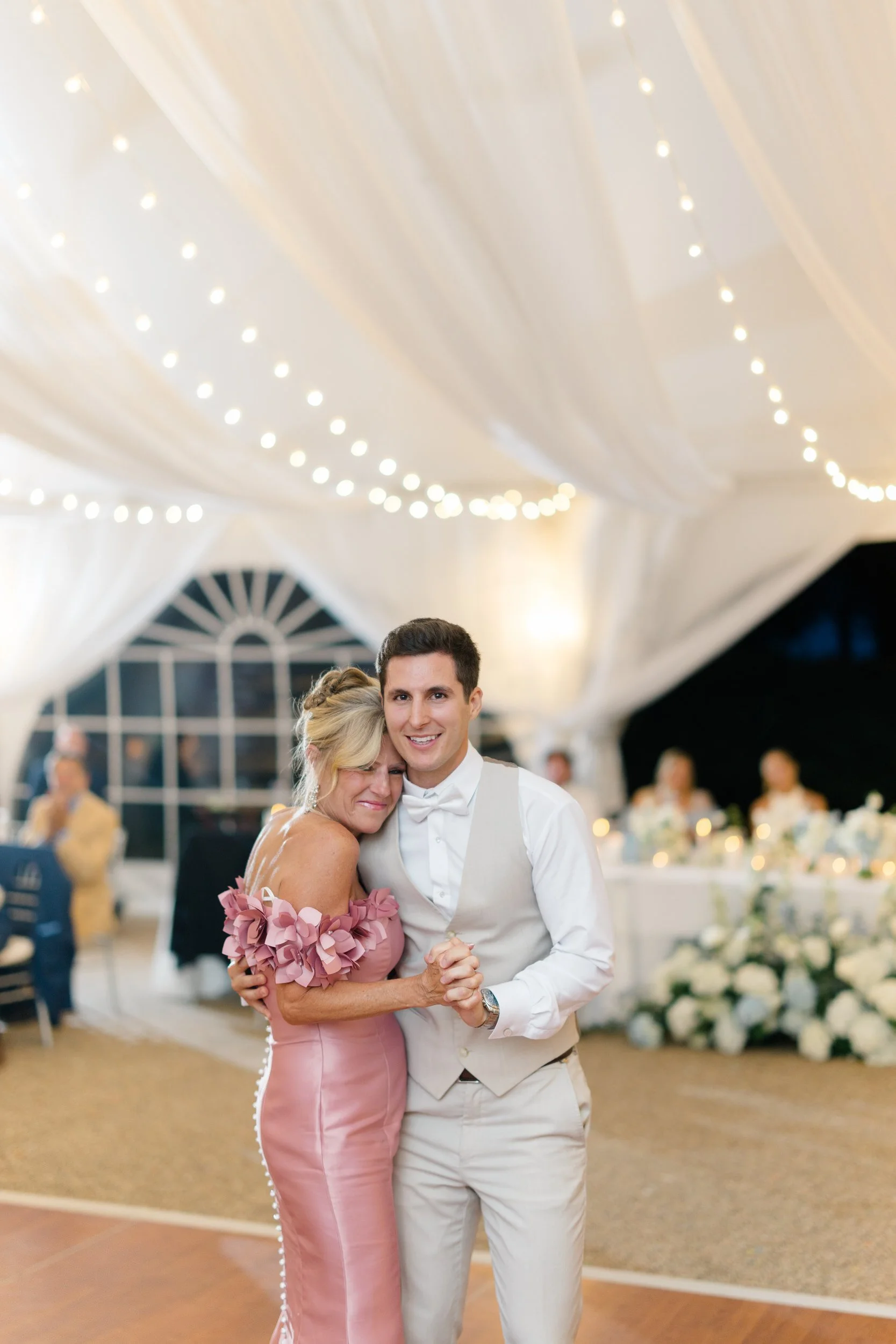 Garden party-inspired reception filled with laughter and celebration.