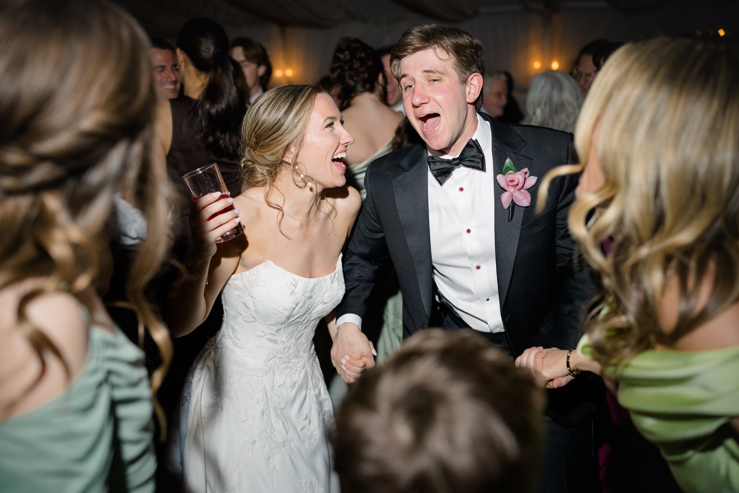 Joyful candid dancing moments at coastal New England wedding