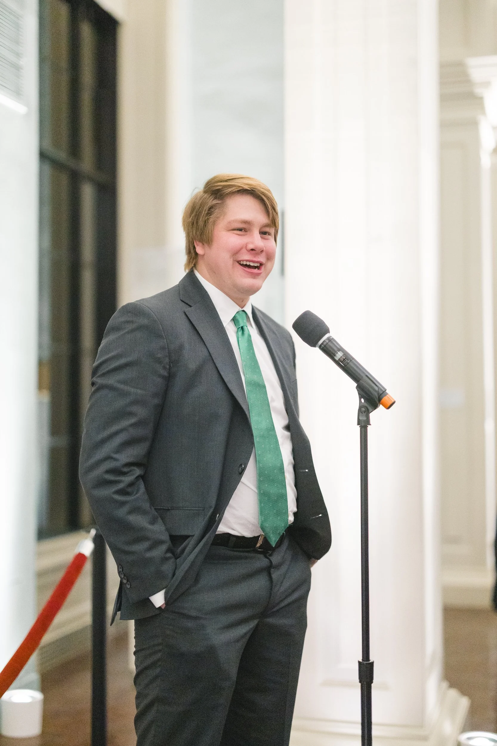 Emotional speech during a candlelit rehearsal dinner at the Boston Athenaeum