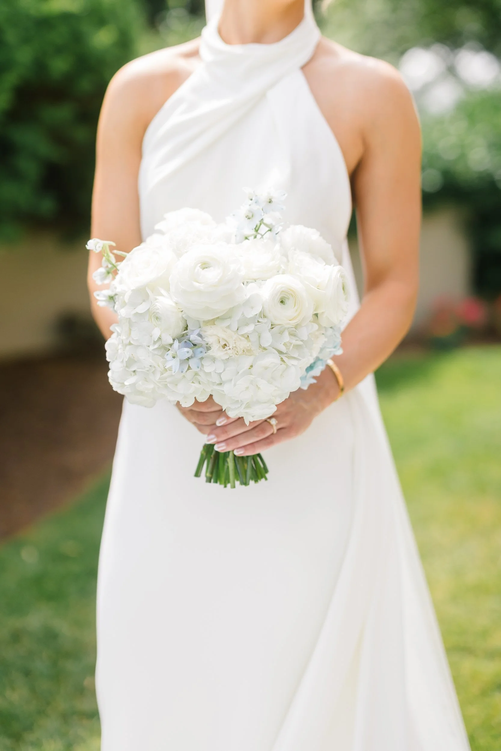 Timeless bridal portraits of the bride in natural light with ocean views at Misselwood Estate.
