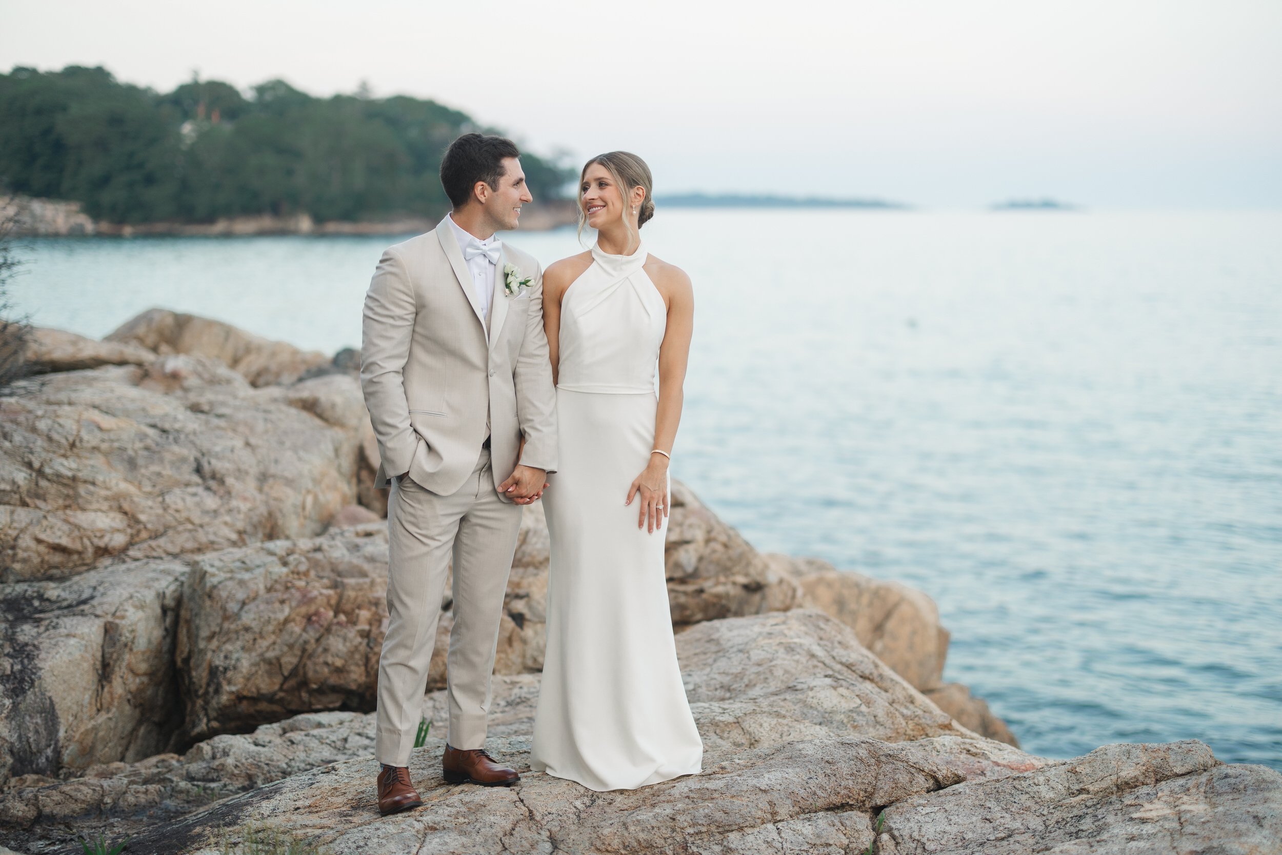 Sunset wedding portraits with ocean views in Beverly, Massachusetts.