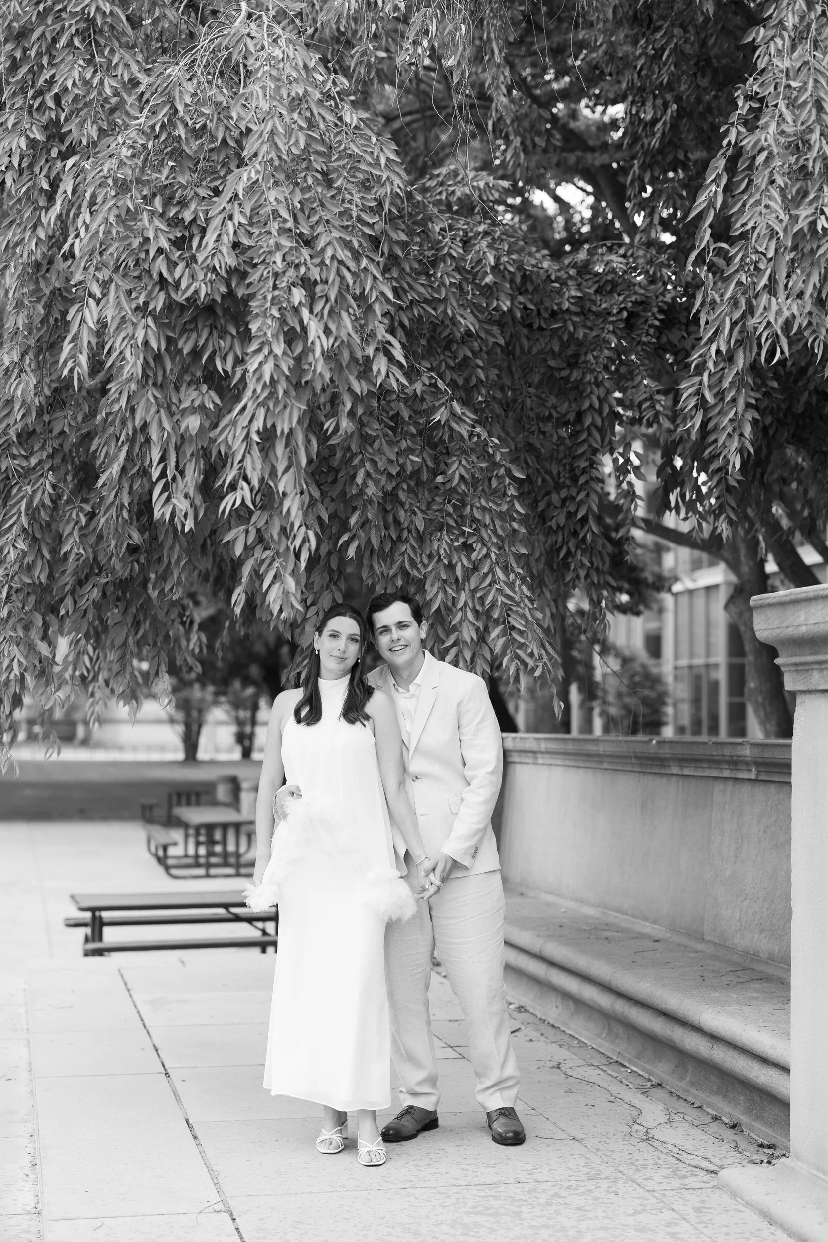 Romantic Cambridge engagement photos with elegant architectural backdrops.