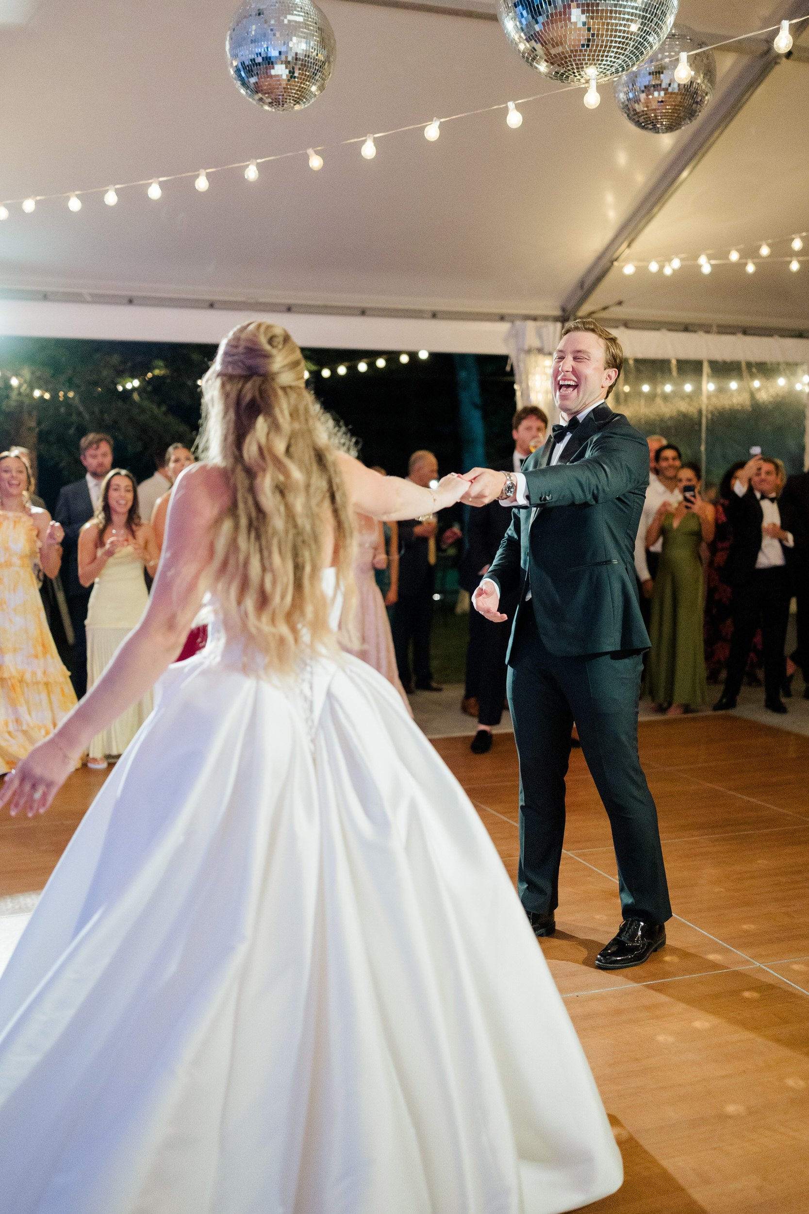 Bride and groom dancing at their Carriage House wedding reception