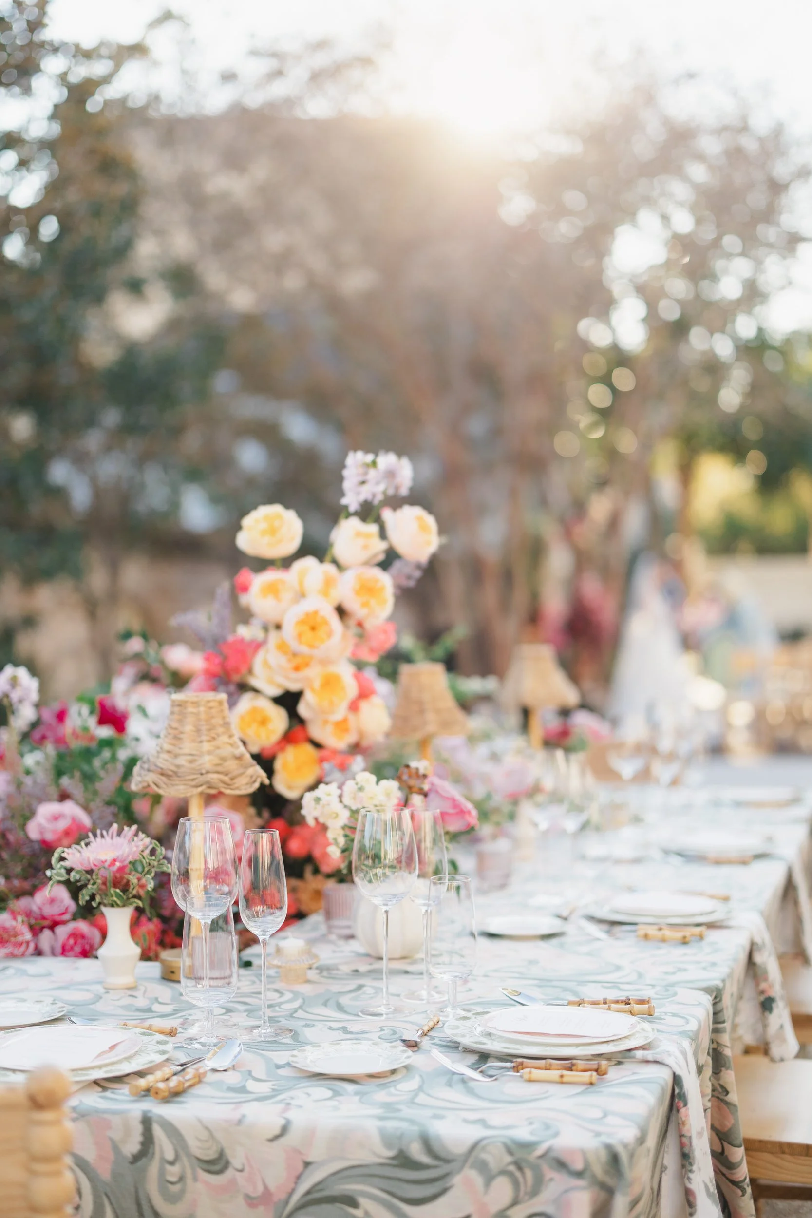 Colorful reception design with lush floral installations at The Gadsen House.