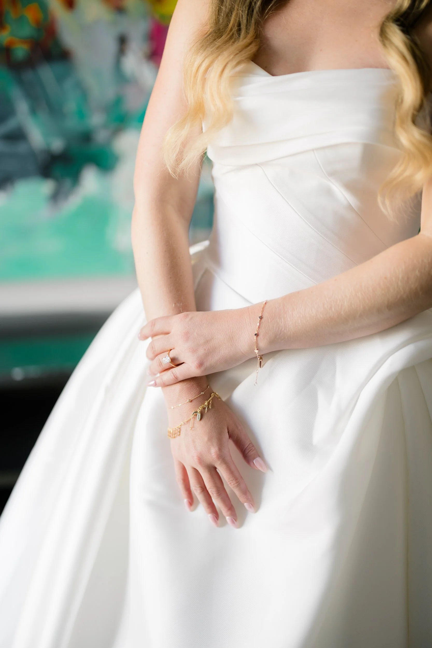 Bride getting ready in her suite at Hotel Commonwealth before her Elm Bank wedding