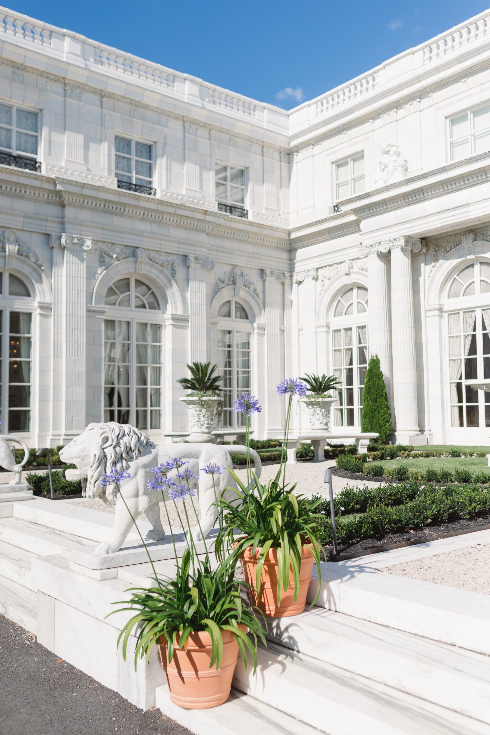 Coastal view of Rosecliff Mansion in Newport, Rhode Island on a summer day