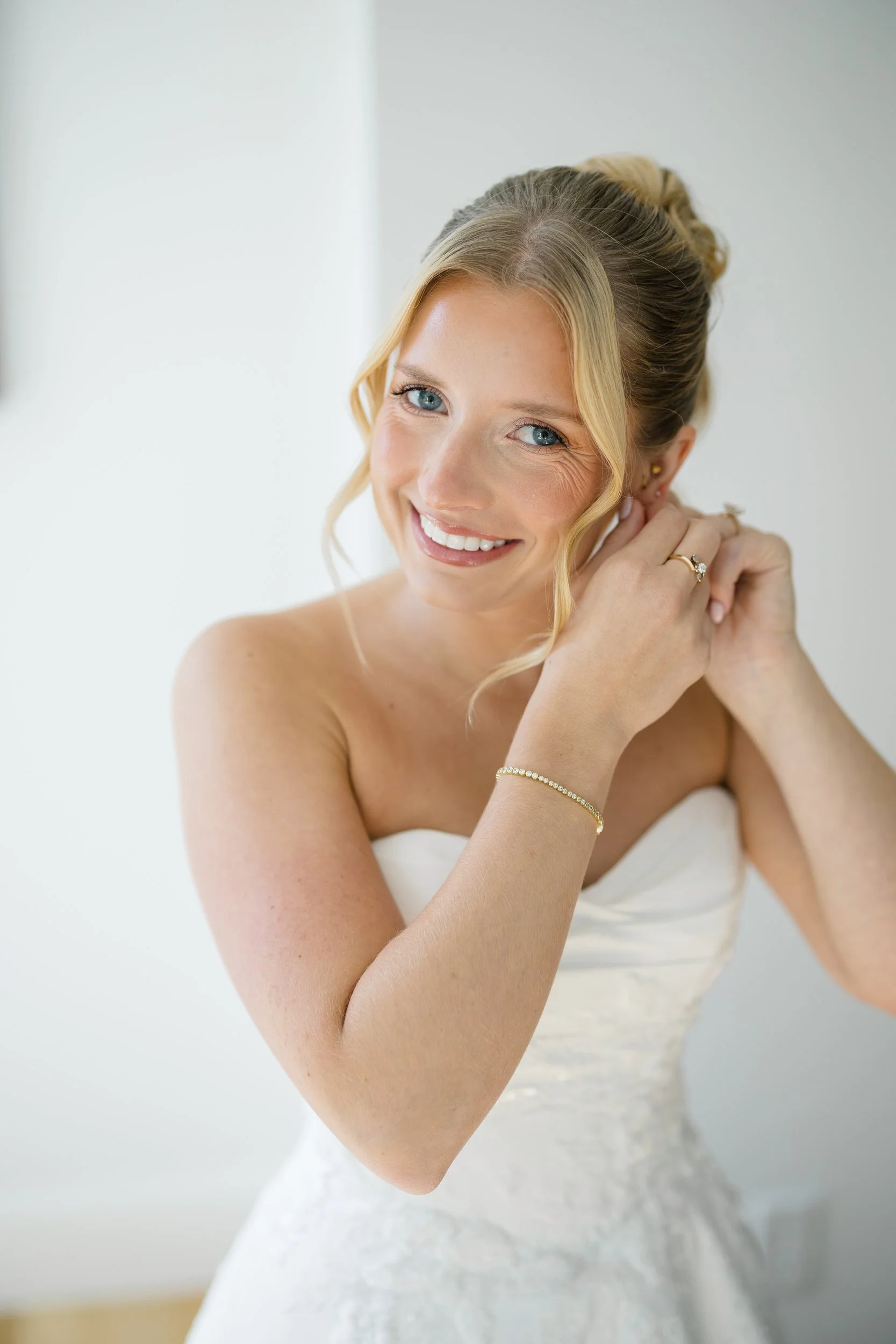 Bride getting ready on her wedding day at Wychmere Beach Club on Cape Cod.
