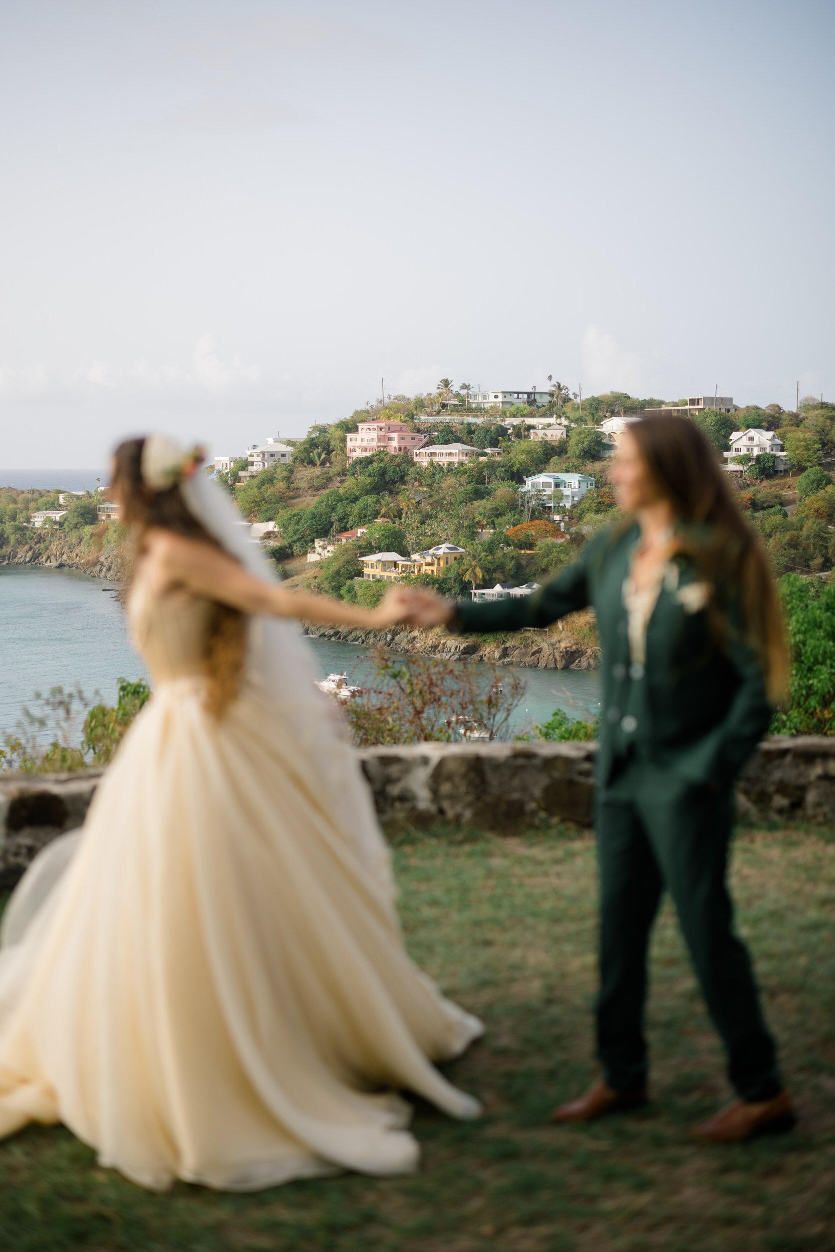 Queer wedding portraits in the US Virgin Islands with a tropical island backdrop.