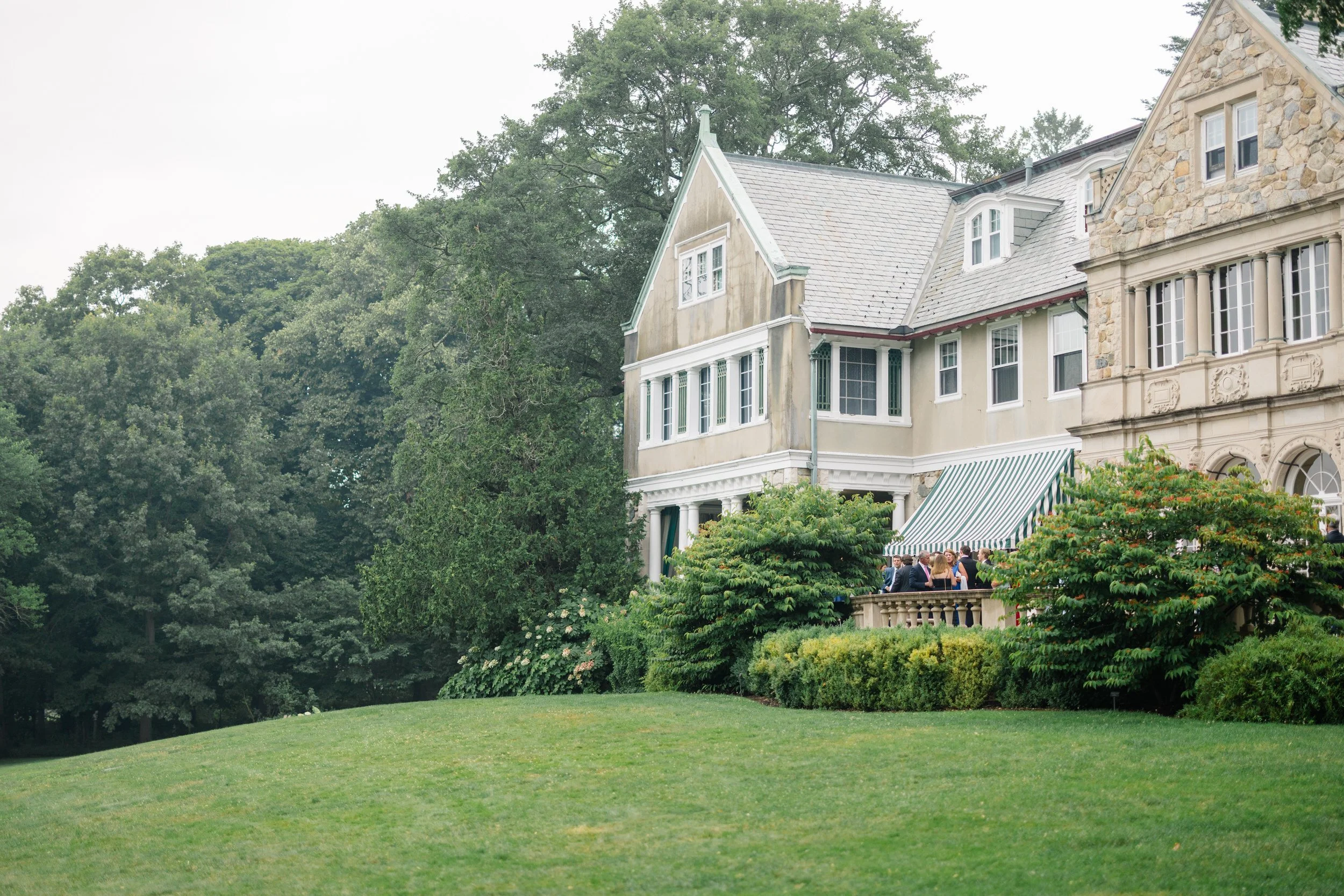 Outdoor cocktail hour overlooking the gardens in Bristol, Rhode Island.