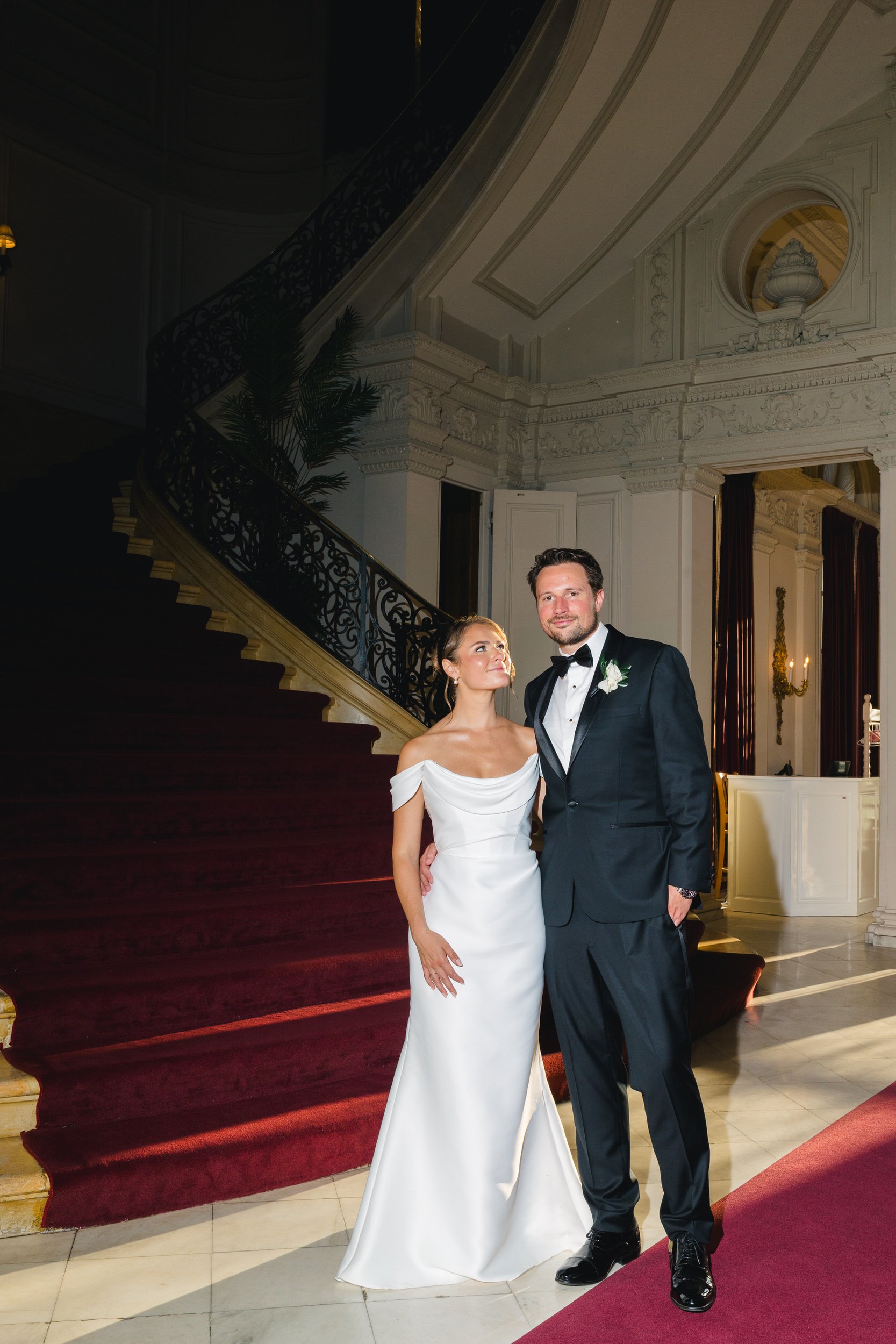 Iconic Rosecliff Mansion staircase wedding moment