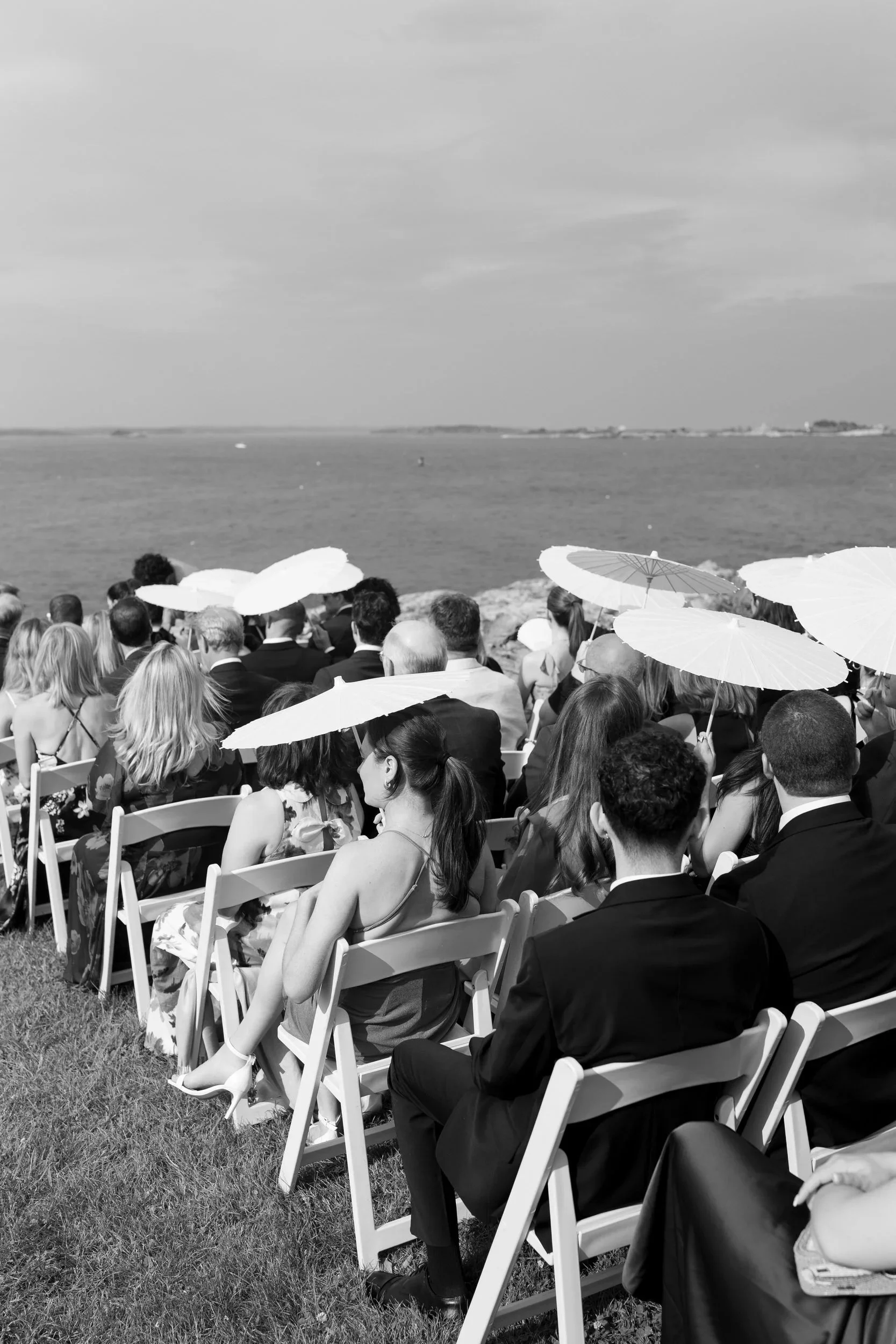 Traditional Jewish wedding ceremony at Chandler Hovey Park overlooking Marblehead Harbor during a Corinthian Yacht Club wedding celebration.