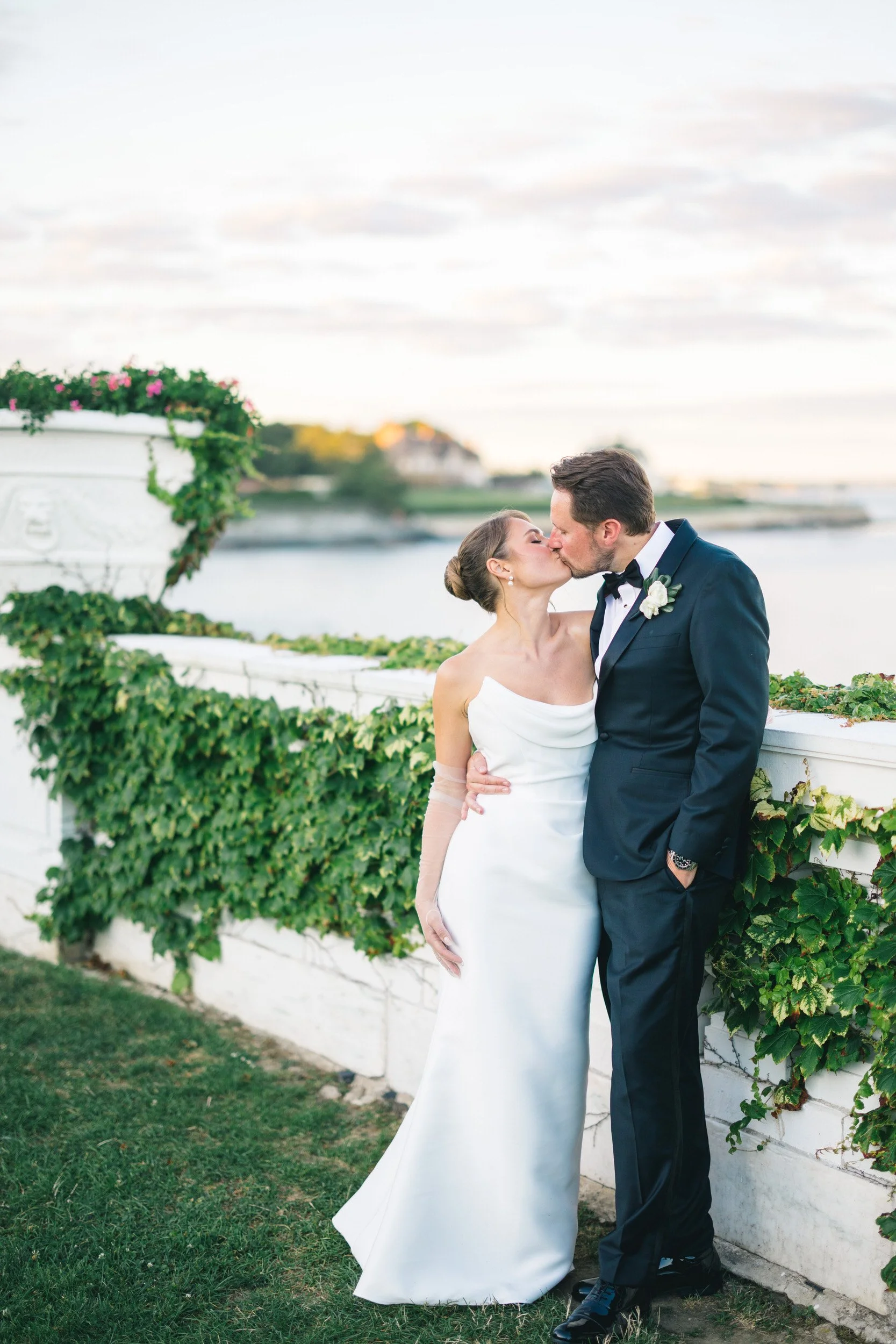 Couple at sunset on the grounds of Rosecliff Mansion