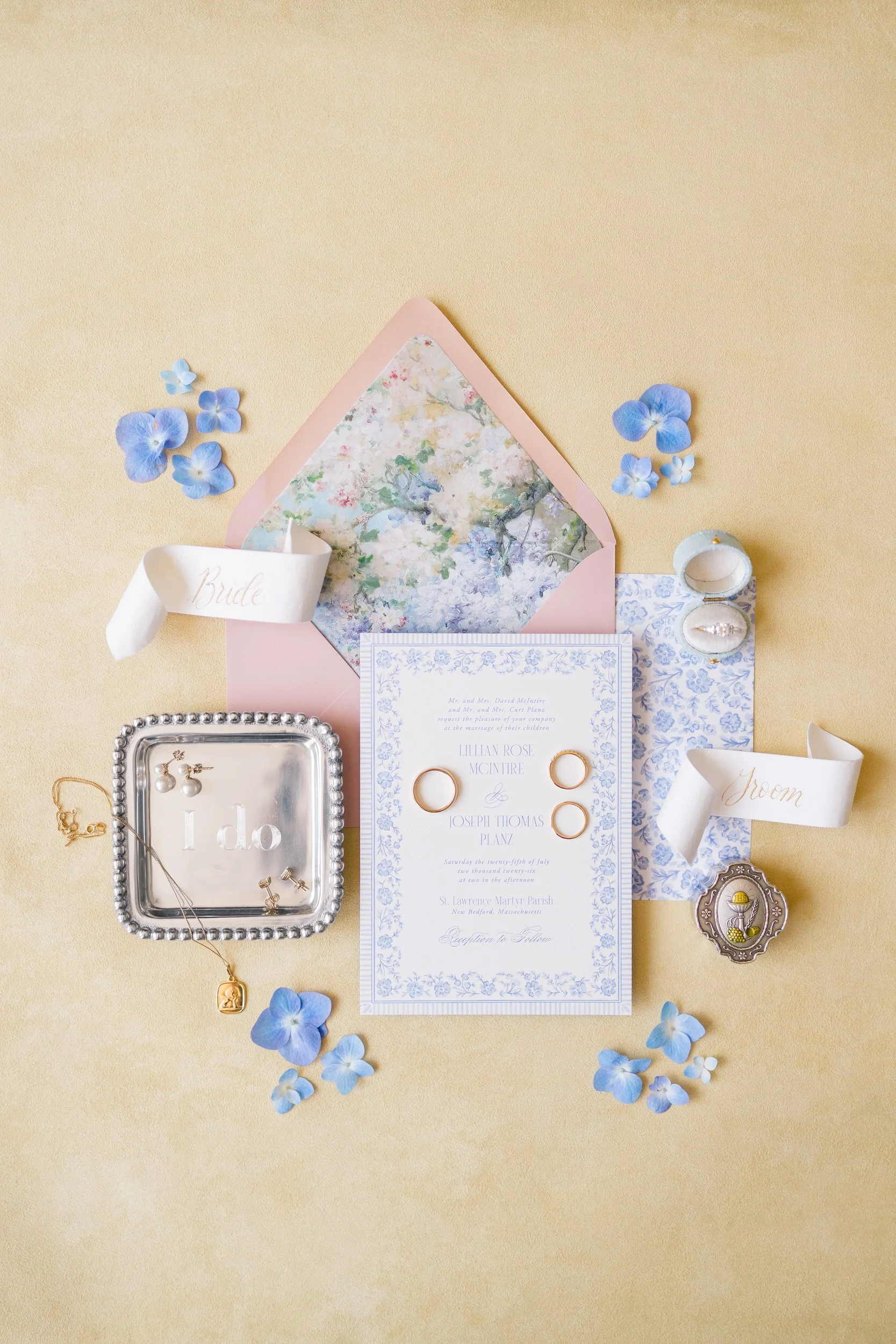 Wedding invitation suite and bridal details for a Cape Cod private estate wedding with rings and heirloom accessories.