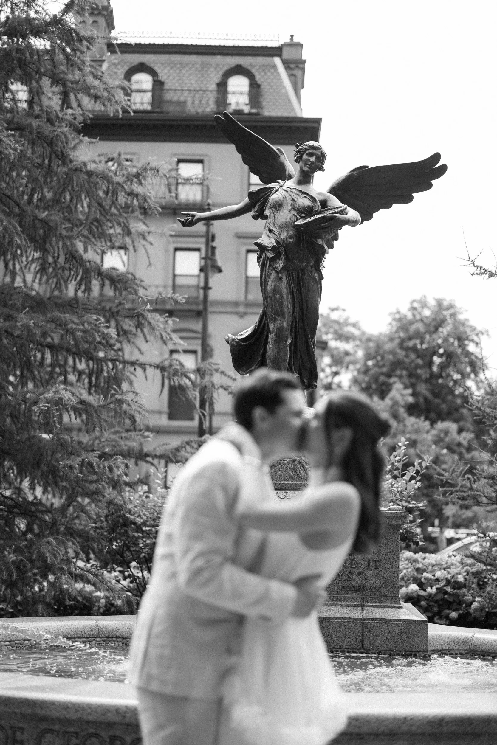 Romantic engagement portraits surrounded by the beauty of the Boston Public Garden.